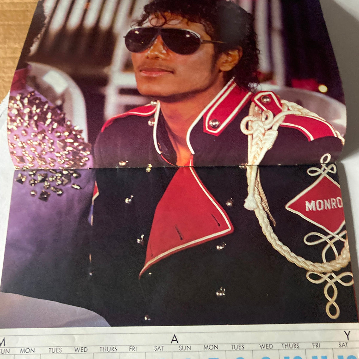 VTG Right On Magazine 1984-1985 featuring Michael Jackson, showcasing the pop icon in stylish sunglasses and a military-inspired outfit for the May calendar page.