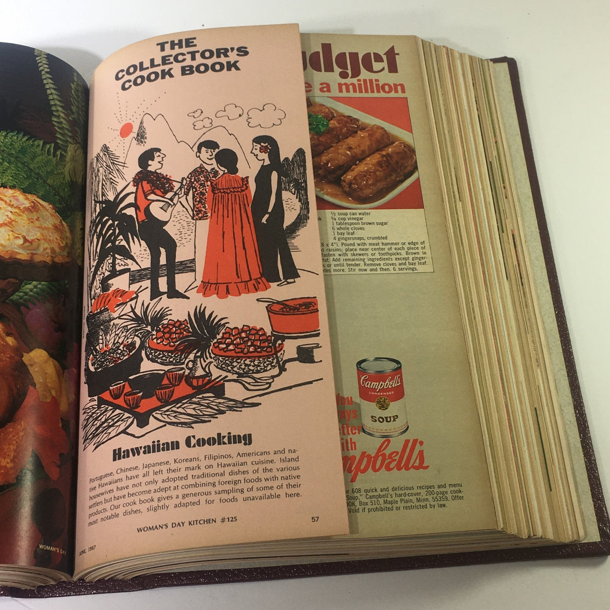 Interior view of the 1967 Woman's Day Magazine Compilation showing a colorful illustration from the 'Collector's Cook Book' section, featuring a Hawaiian cooking theme and a vintage advertisement for Campbell's Soup.