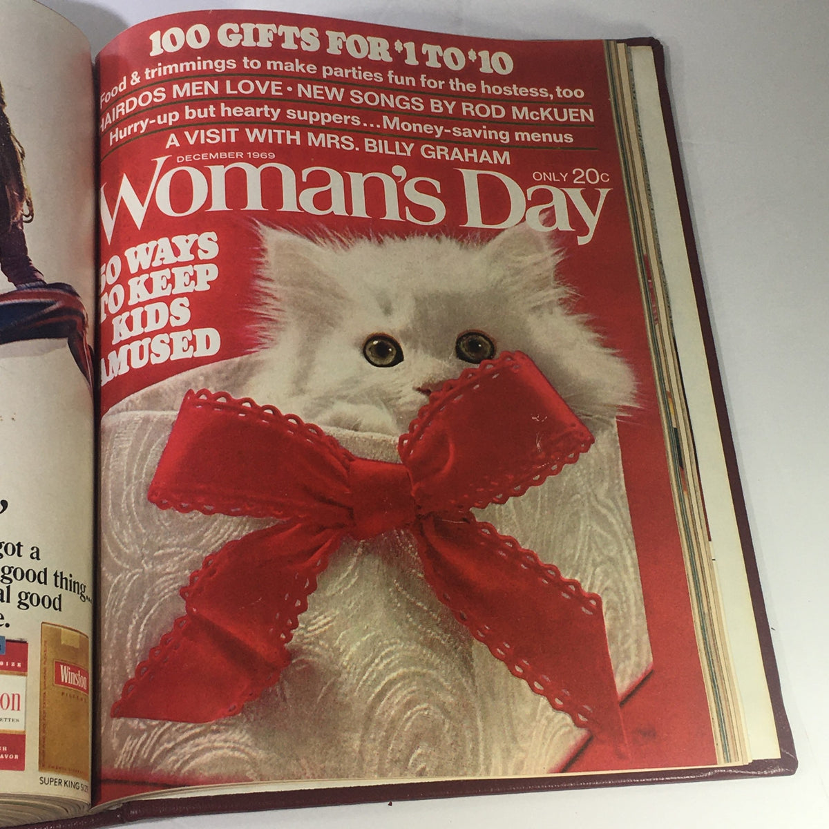 1969 Woman's Day Magazine Compilation highlighting a cute kitten wrapped in a gift box on the cover from December issue.