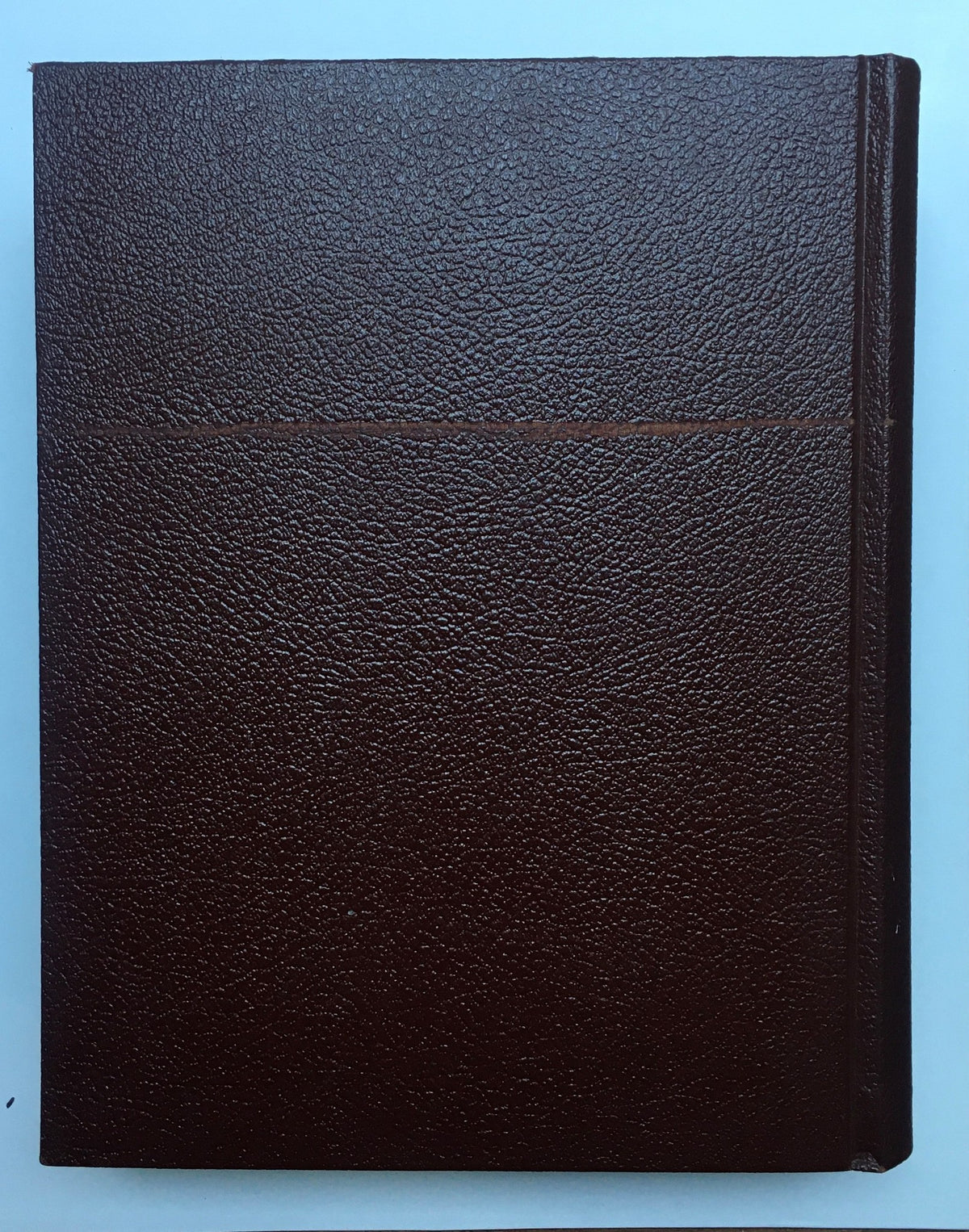 The brown leather-bound cover of the 1956 Woman's Day Magazine Complete Year Round in One Book Compilation.