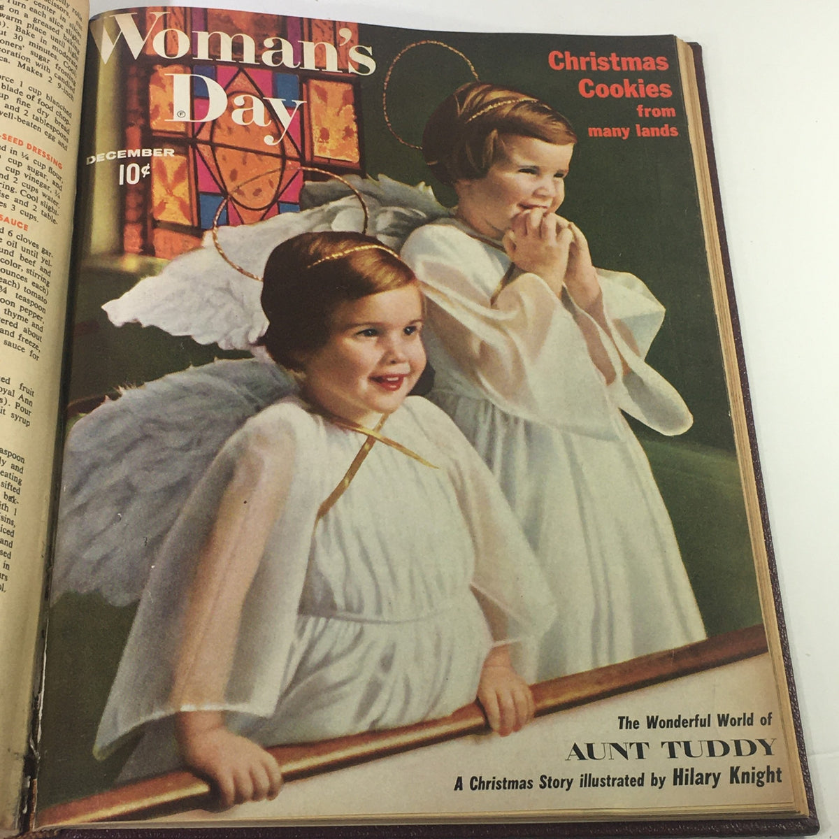 Cover of the 1958 Woman's Day Magazine featuring two children in angel costumes with Christmas Cookies theme, showcasing vintage charm and festive spirit.