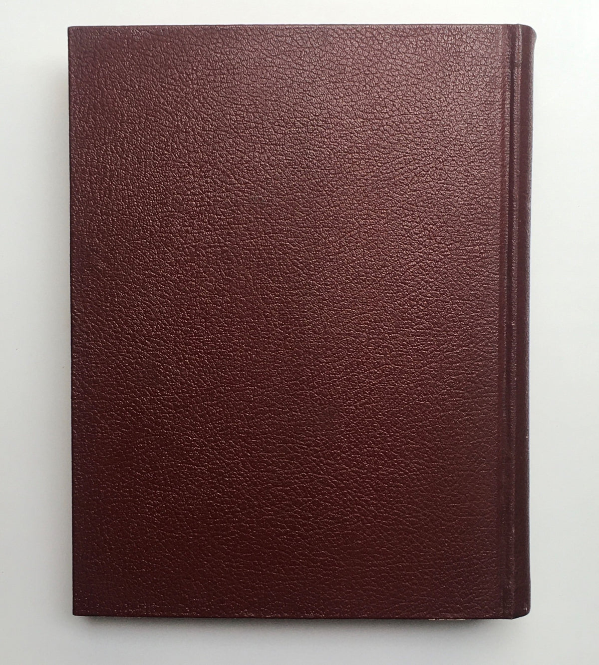 Spine view of the 1958 Woman's Day Magazine complete year round compilation, displaying its vintage design and sturdy binding.