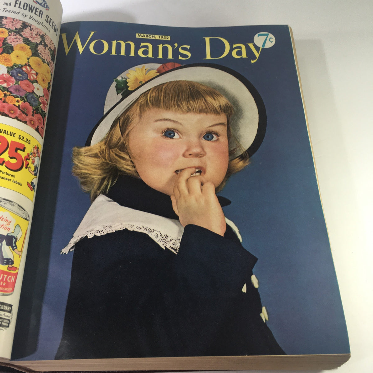 Cover page of March 1952 issue from the 1952 Woman's Day Magazine Complete Year Round In One Book Compilation, featuring a girl in a hat with a playful expression.