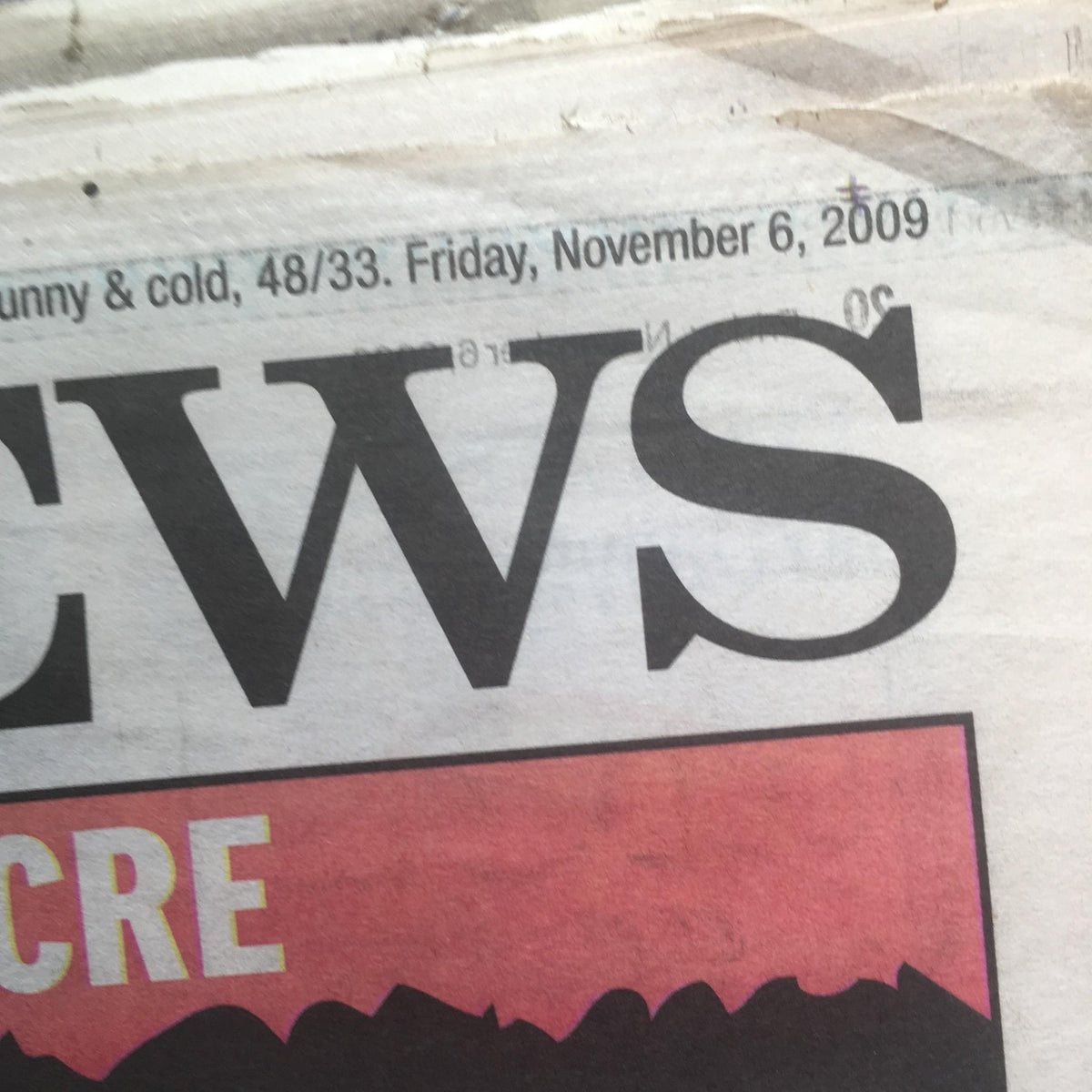 New York Daily News headline from Nov 6, 2009, featuring the text 'NEWS' with weather details on the side, highlighting the date and importance of current events.