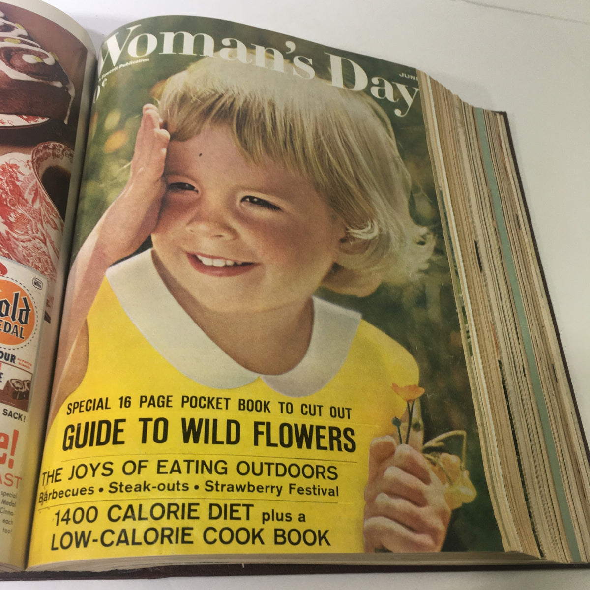 1960 Woman's Day Magazine June issue highlighting a smiling child on the cover.
