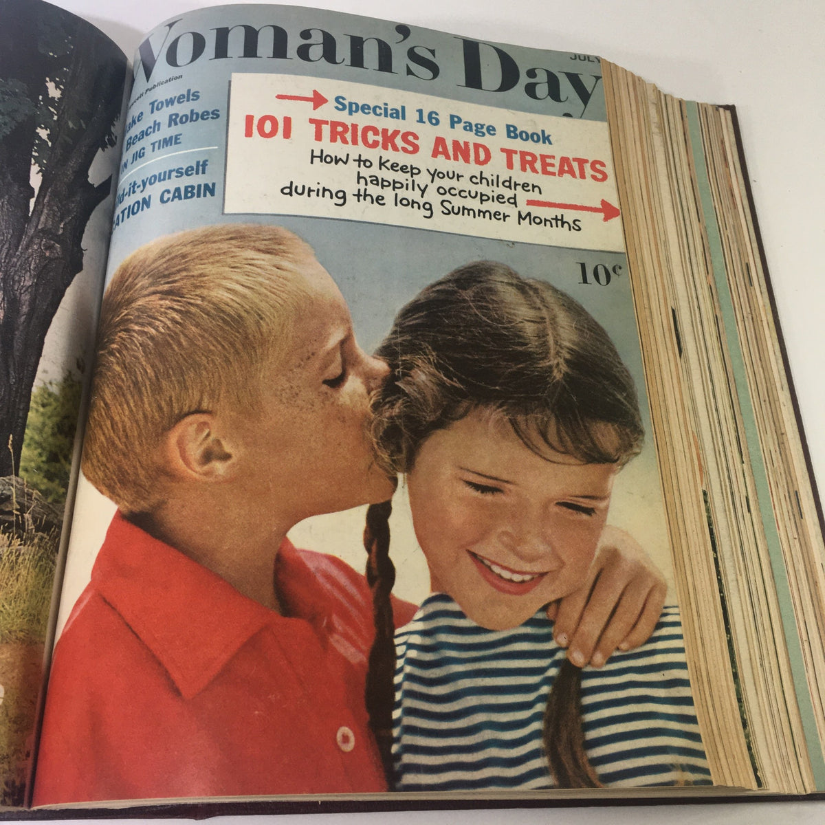 1960 Woman's Day Magazine July issue featuring two children sharing a moment on the cover.