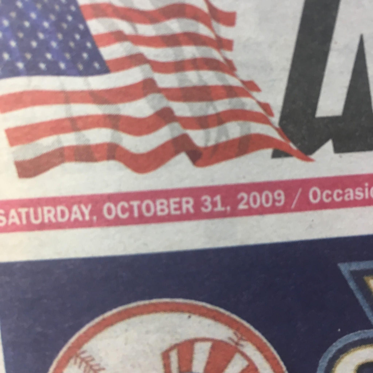 The New York Post dated October 31, 2009, showcasing an American flag and highlighting the date along with sports team logos.