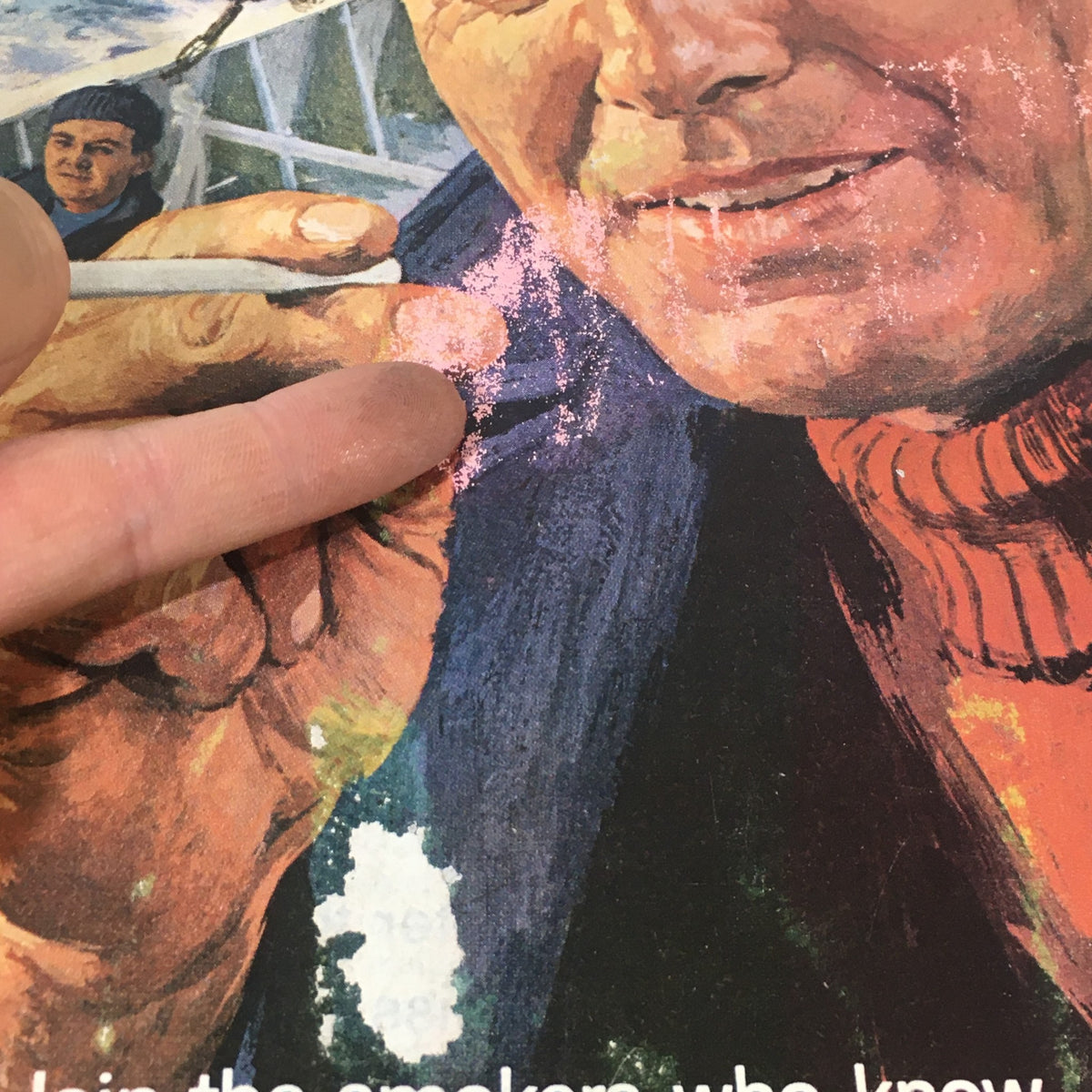 Close-up of a sailor holding a cigarette from the cover of 'VTG The Saturday Evening Post May 7 1966', showcasing vintage advertising.