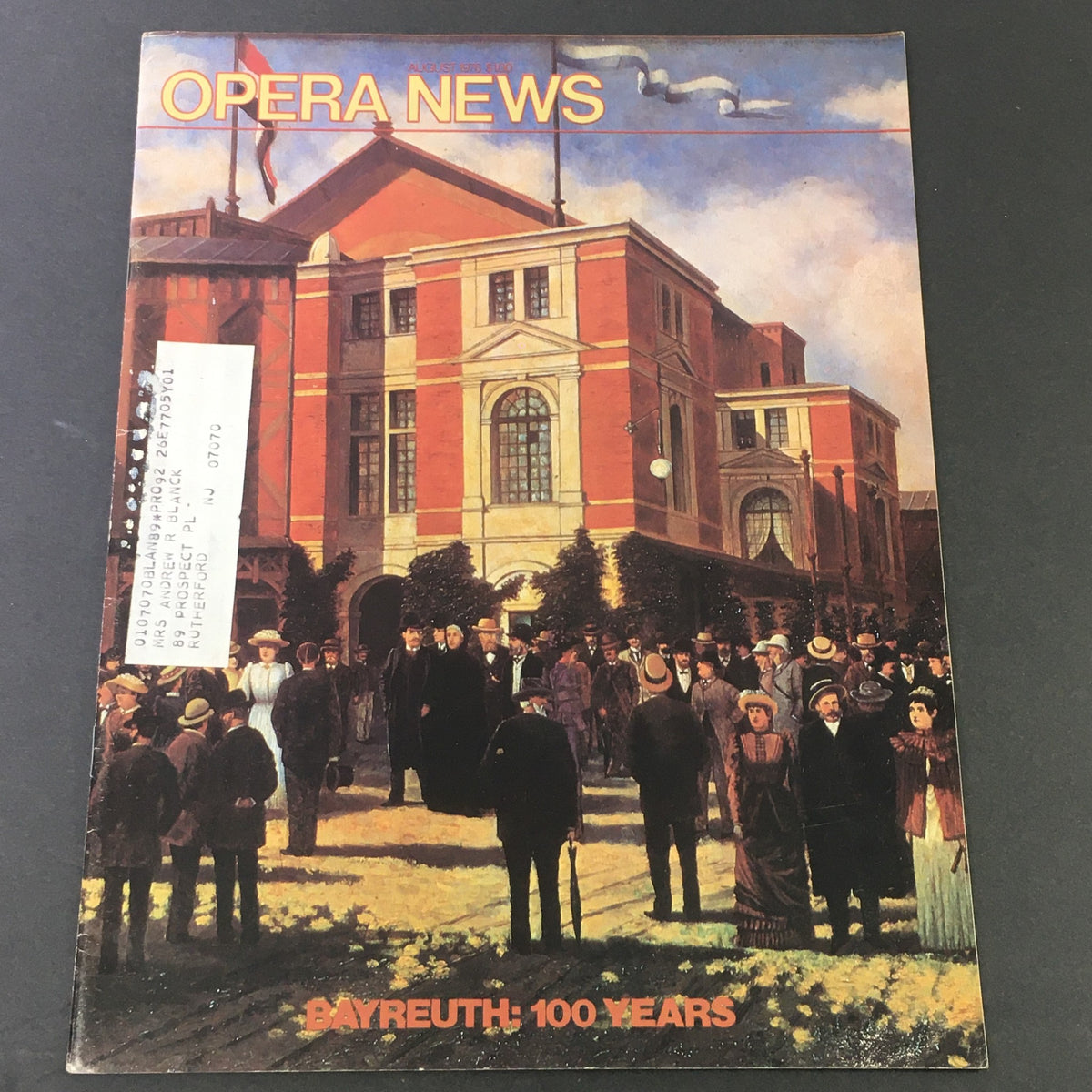 Cover of VTG Opera News Magazine August 1976 featuring a historic view of Bayreuth celebrating 100 years. The image shows a crowd gathered in front of the opera house with a colorful sky and detailed architecture.