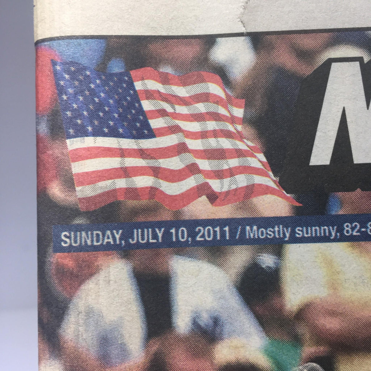 Detail of the New York Post dated July 10, 2011, showing an American flag and weather information alongside Derek Jeter's historic achievement.