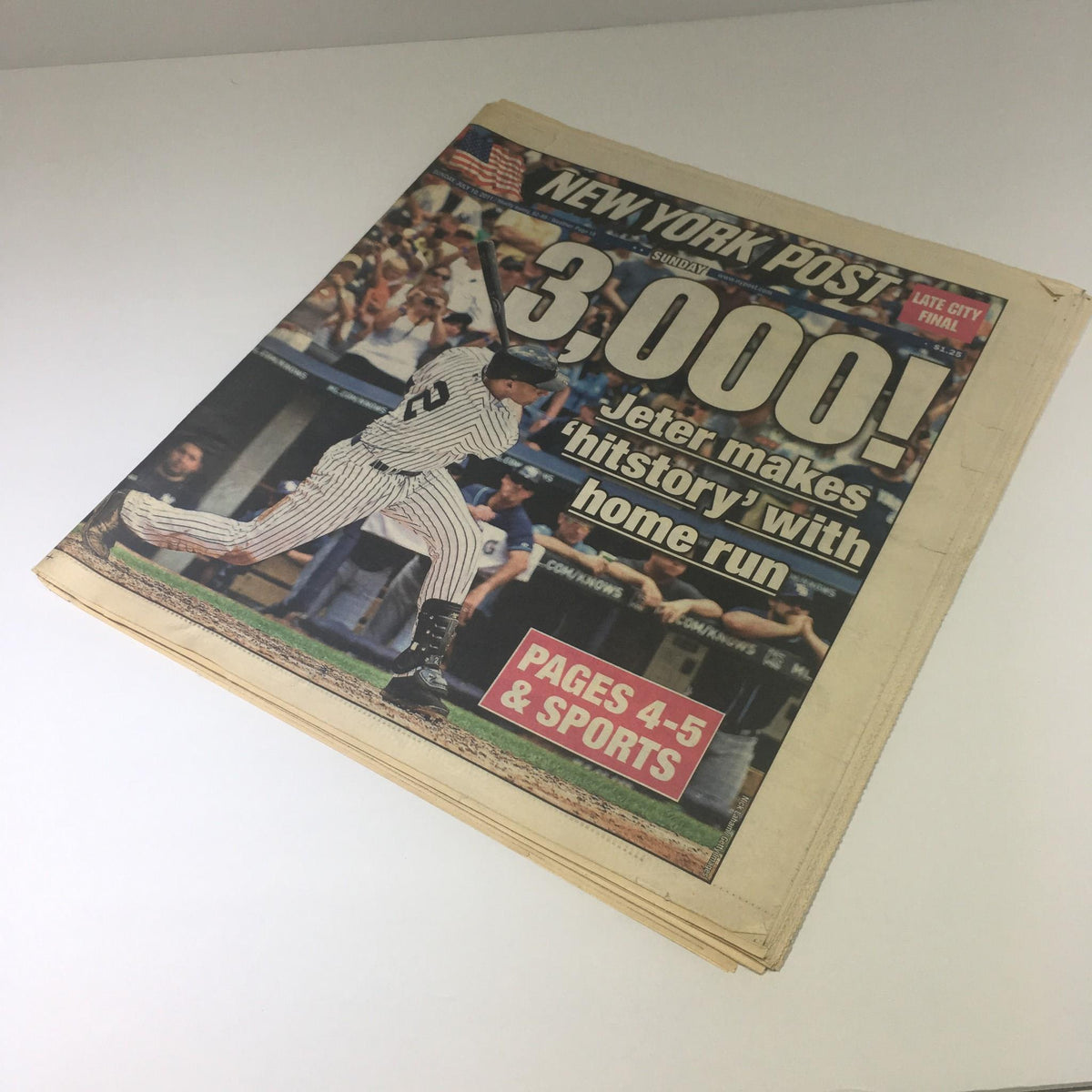 Another view of the New York Post featuring Derek Jeter hitting his 3000th home run, highlighting the historic moment in sports history.