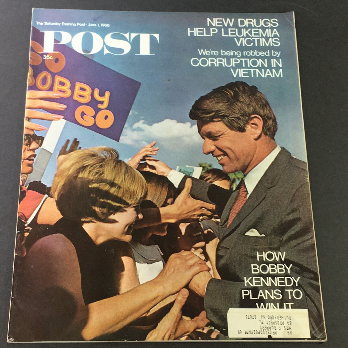 Cover of VTG The Saturday Evening Post June 1 1968 featuring Bobby Kennedy Plans to Win, showcasing an engaging political scene with crowds and the iconic slogan 'Bobby Go'.