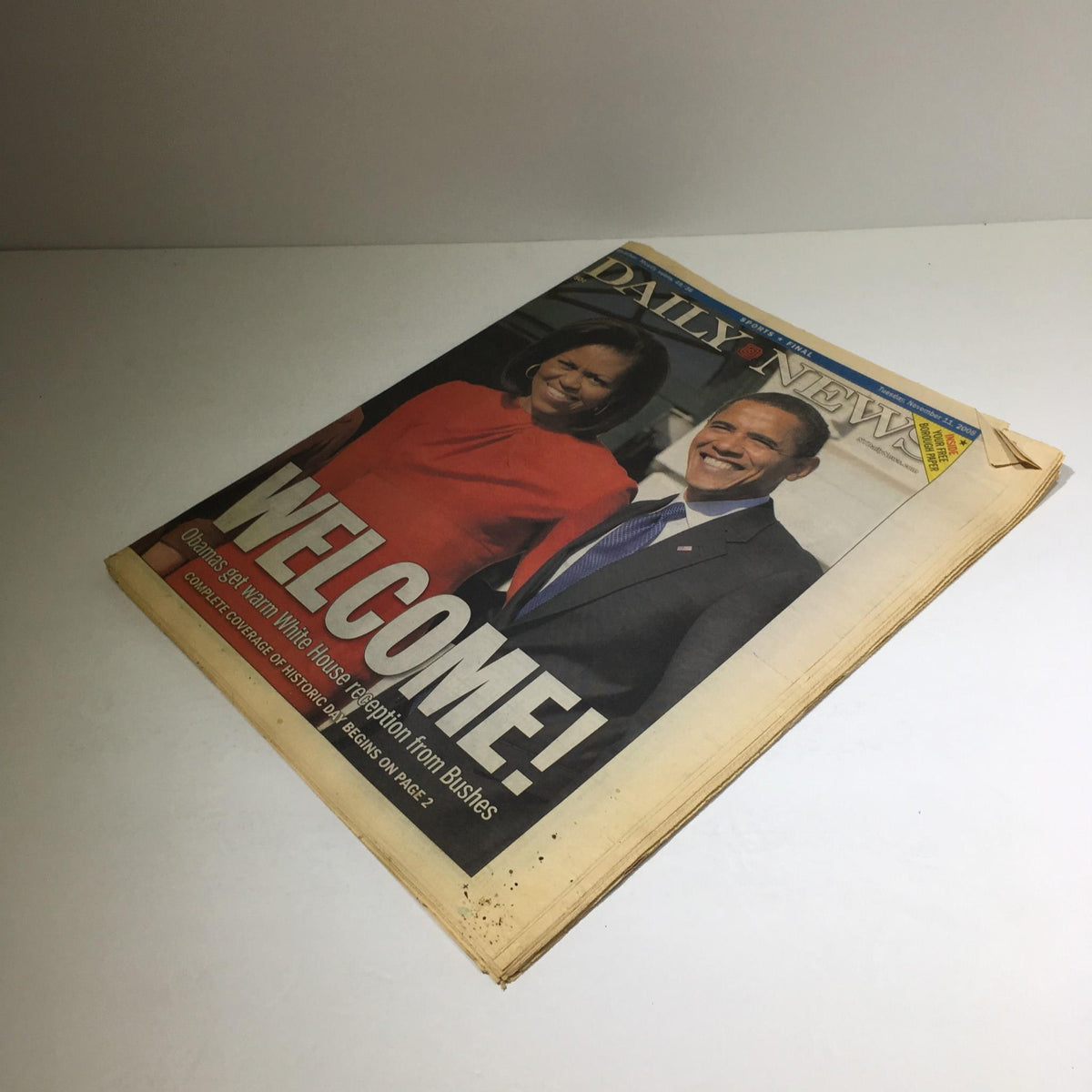 New York Daily News cover showcasing President Barack Obama and Michelle Obama with the headline 'WELCOME!' during their reception at the White House. Date: 11/11/08.