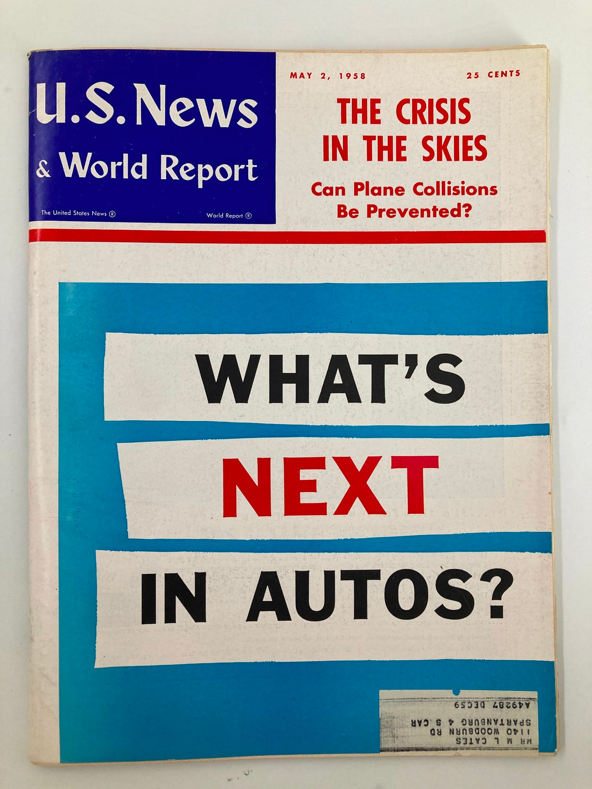 Cover of US News & World Report Magazine dated May 2, 1958, featuring the headline "The Crisis in The Skies" along with a question about plane collisions, and the additional text "What's Next in Autos?" The magazine is presented in good condition with vintage design elements.