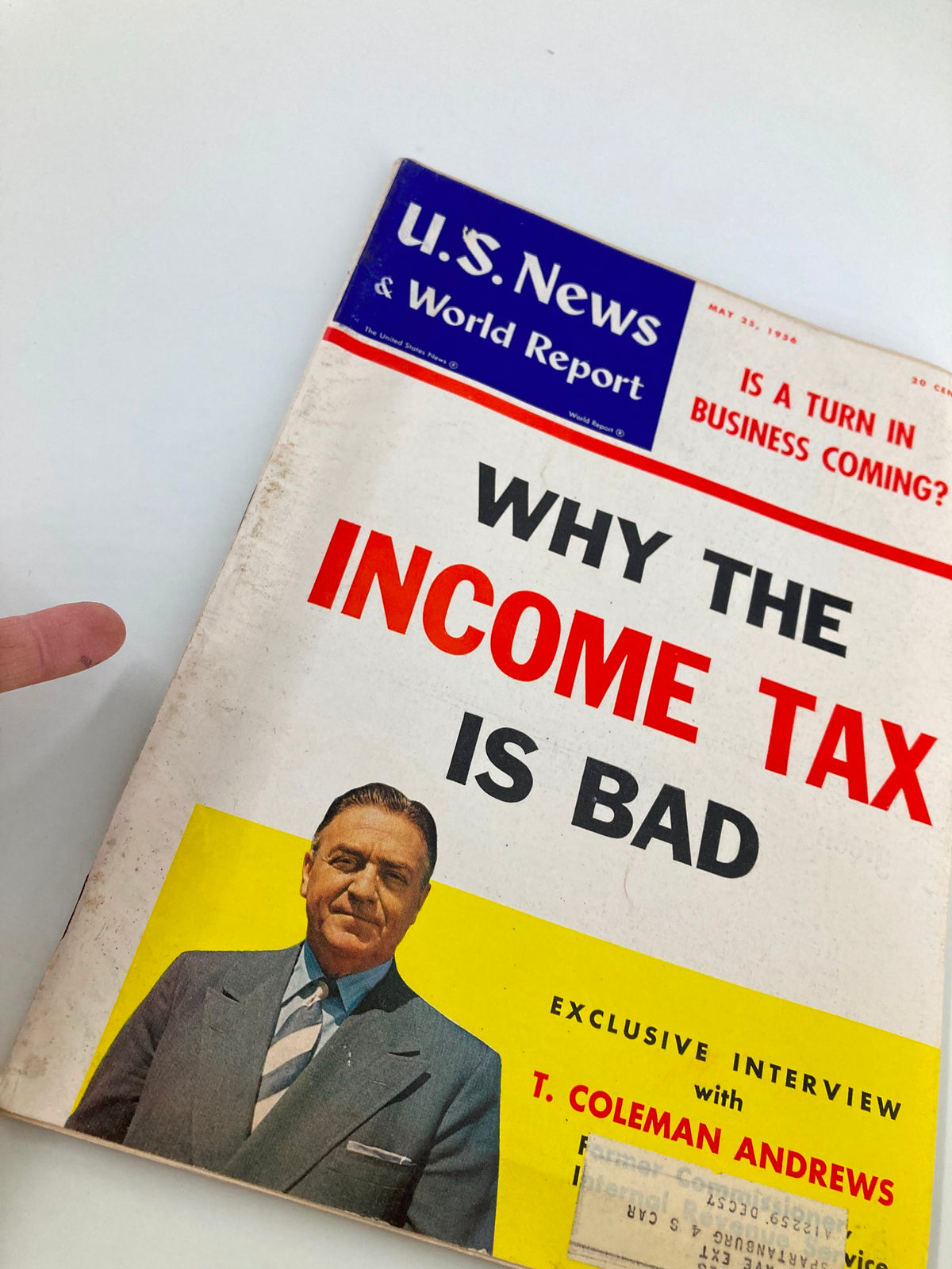 Cover of US News & World Report Magazine May 25 1956, showcasing the title 'Why The Income Tax Is Bad' alongside an image of T. Coleman Andrews and the note 'Is a Turn in Business Coming?'.