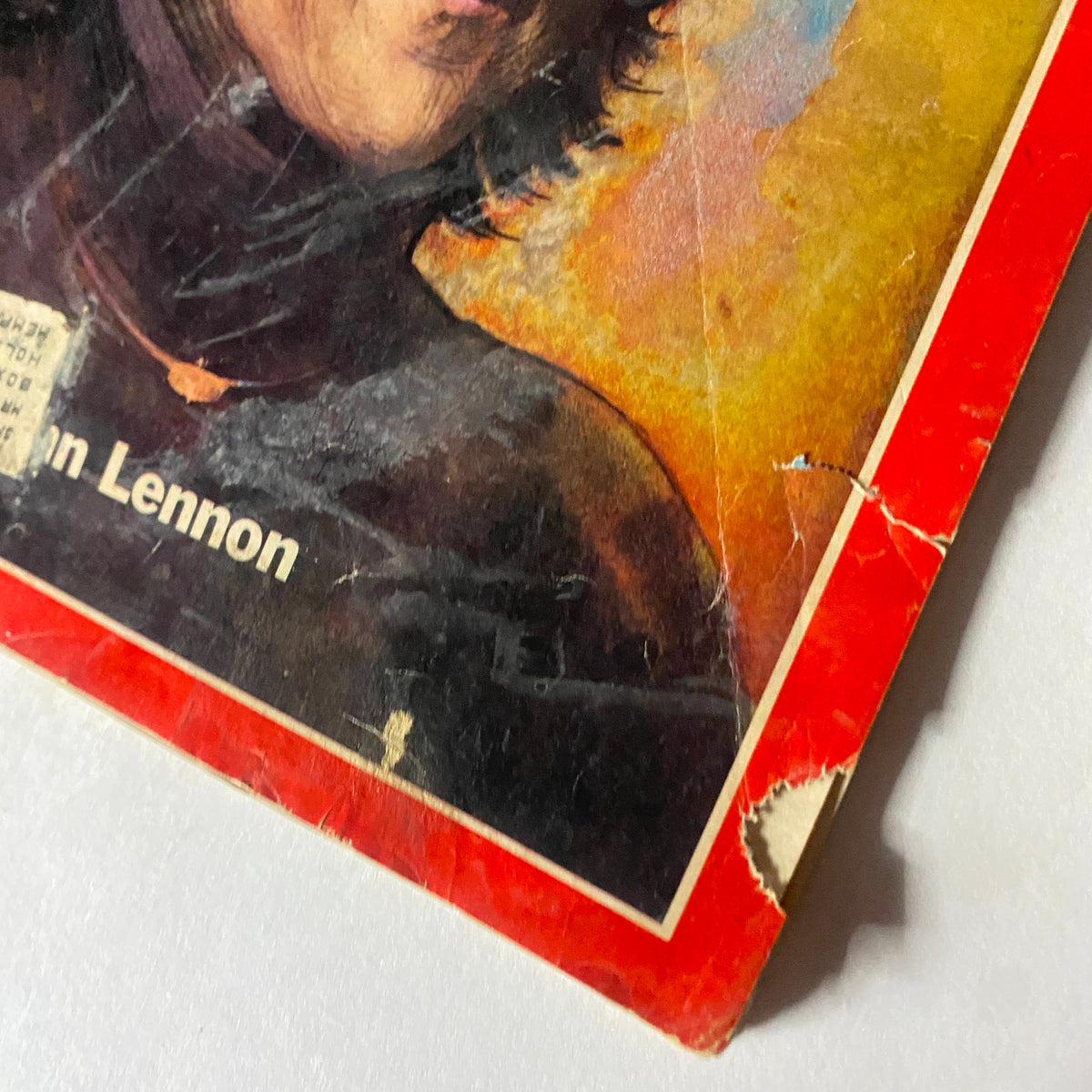 Close-up detail of the vintage December 22, 1980 Time Magazine featuring John Lennon, highlighting the worn cover and the iconic title 'When The Music Died.'