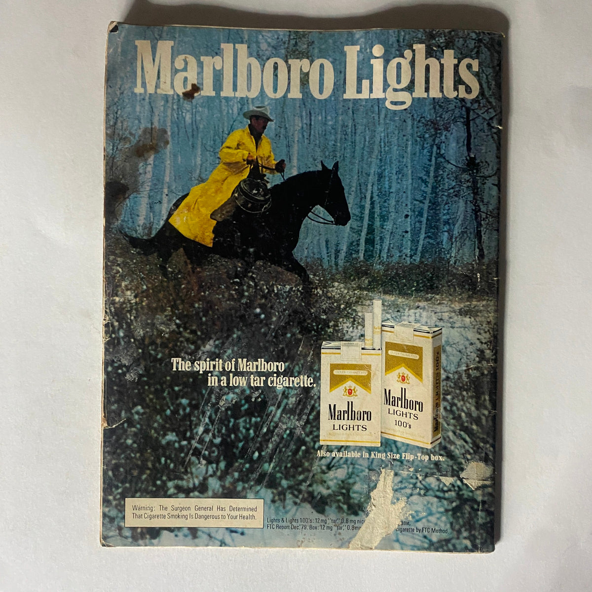 Back cover of the vintage December 22, 1980 Time Magazine featuring an advertisement for Marlboro Lights, showcasing a rider on horseback in a forest setting.