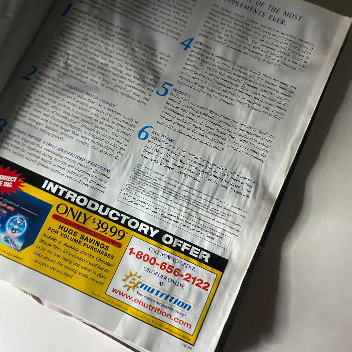 Inside page of Muscle & Fitness Magazine April 2000 displaying a supplement advertisement and fitness tips.