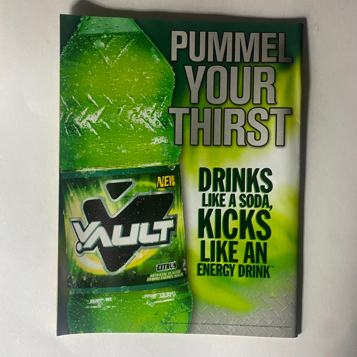 Vault energy drink advertisement highlighting the refreshing citrus flavor with the tagline 'Pummel Your Thirst,' promoting drinks that energize like soda.