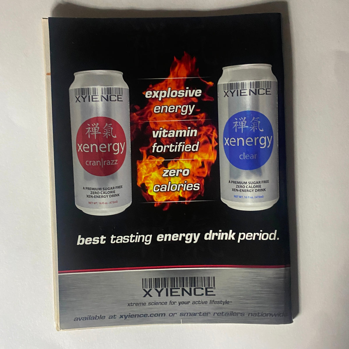 Back cover of Real Fighter Magazine 2006 Issue 8 advertising XYIENCE energy drinks with bold text highlighting explosive energy and zero calories.