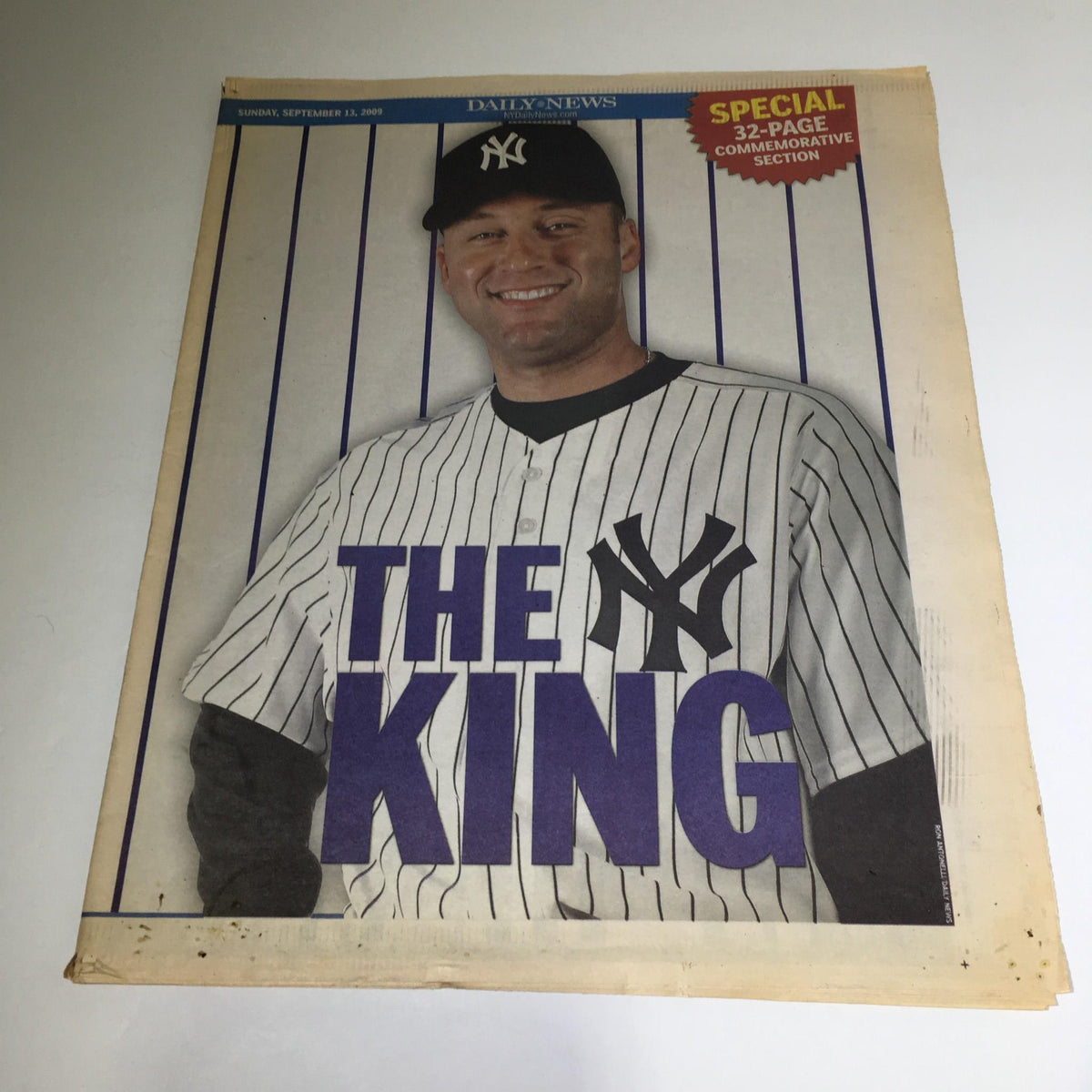 Front cover of the NY Daily News September 12, 2009 edition showcasing Derek Jeter in a Yankees uniform with the title 'THE KING' prominently displayed.