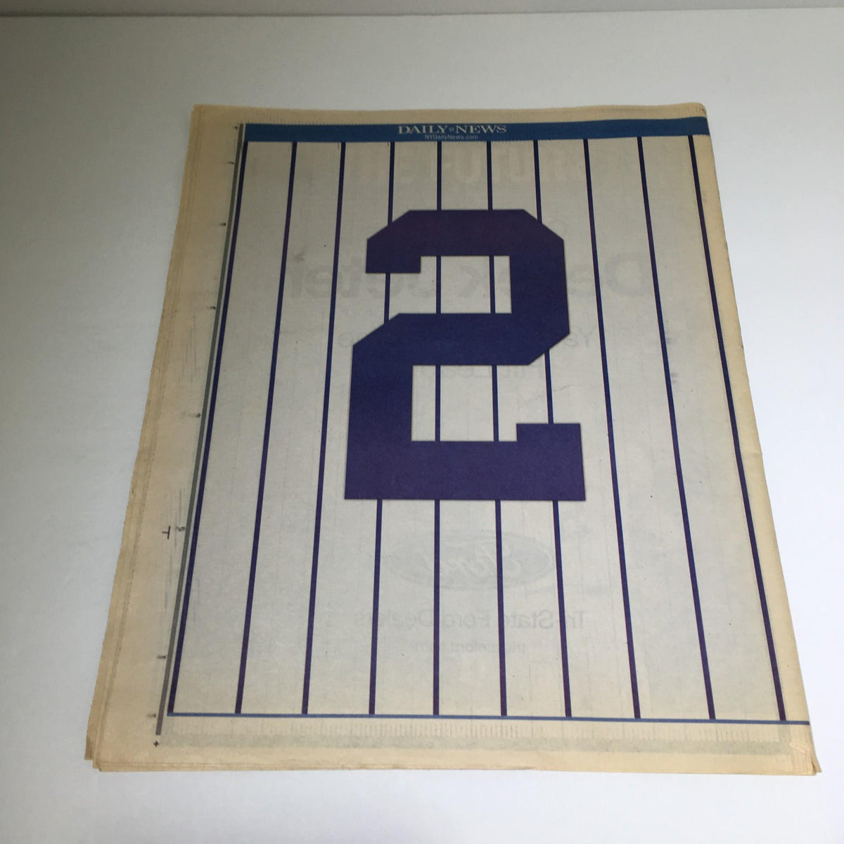 Cover from the NY Daily News: Sept 12 2009 issue featuring the number 2, representing Derek Jeter's iconic jersey number.