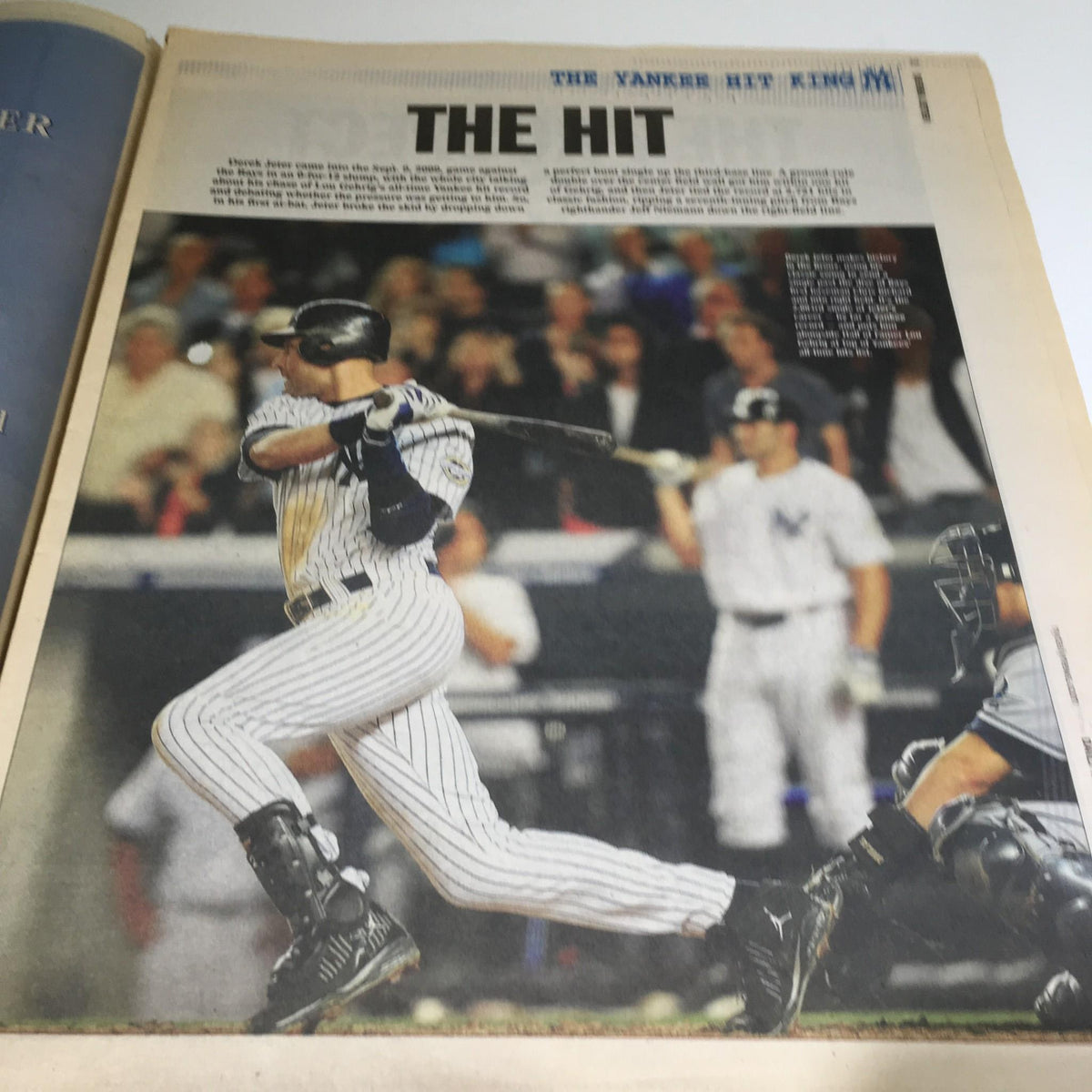 Praise and analysis of 'the hit' in the NY Daily News: Sept 12 2009, highlighting Derek Jeter's pivotal moment in baseball history.