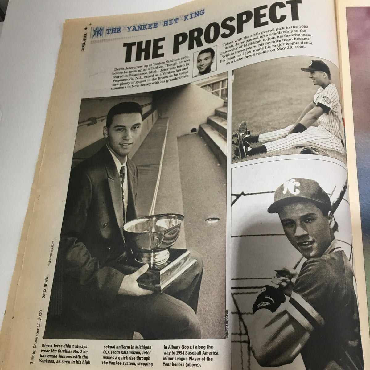 Feature article titled 'The Prospect' from the NY Daily News: Sept 12 2009, showcasing young Derek Jeter with his trophy and early baseball career.