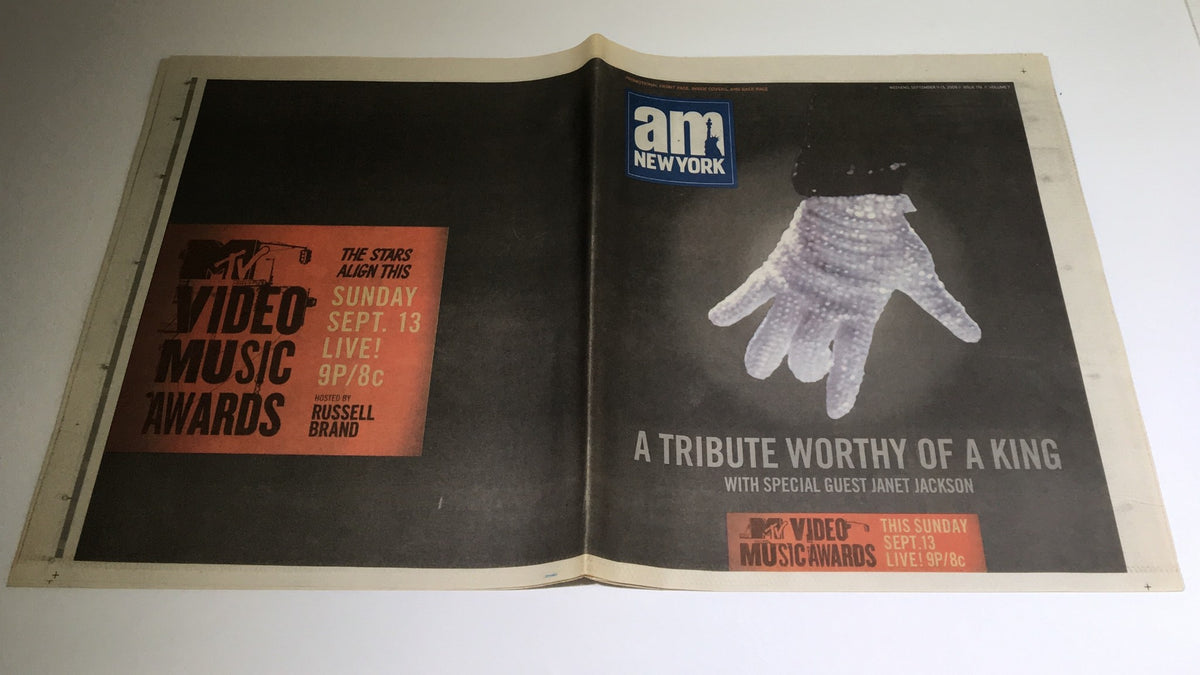 Cover of Am New York: September 11-13 2009, A Tribute Worthy of a King featuring a hand in a white glove and promotional text for the MTV Video Music Awards, highlighting a performance by Janet Jackson.