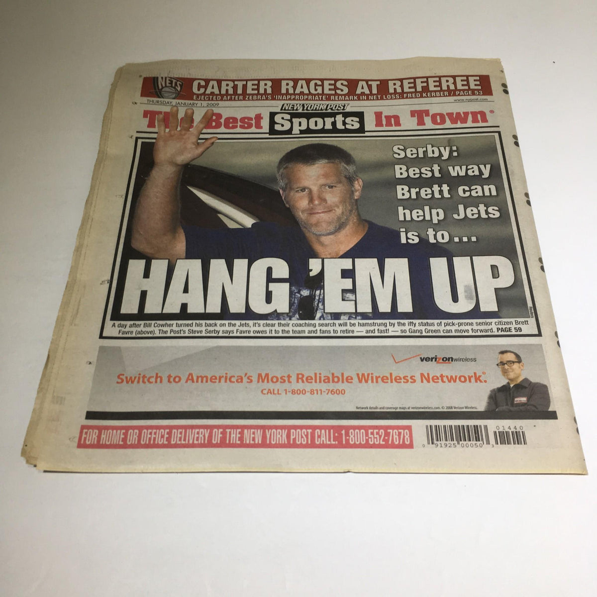 New York Post cover with a focus on sports, featuring a headline about Brett Favre and the text 'HANG 'EM UP,' capturing sports news from January 1, 2009.