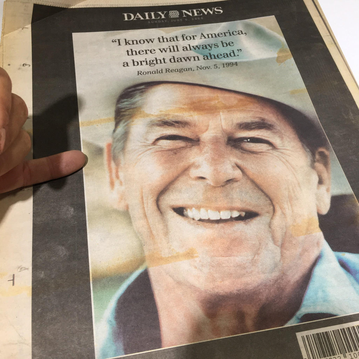 Image of the front cover of New York Daily News: 06/6/04, showcasing Ronald Reagan's quote about hope and his vision for America.