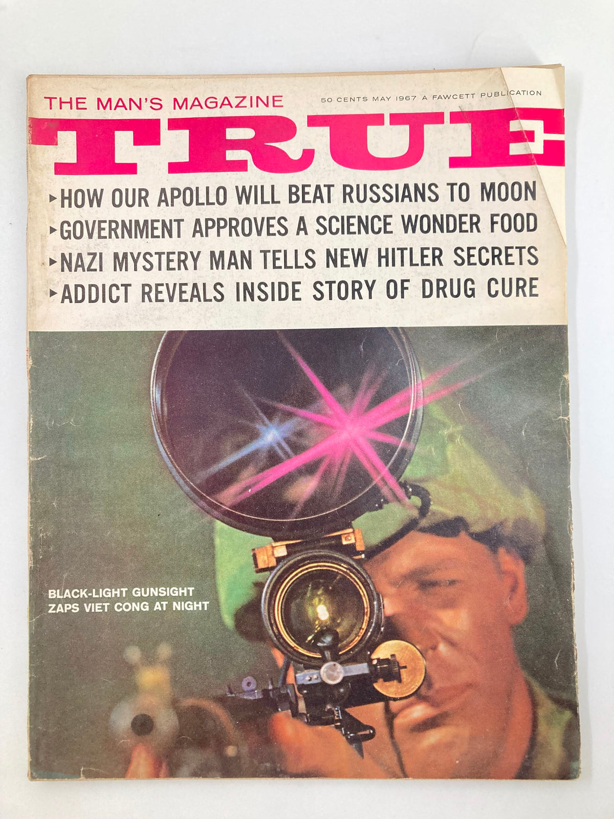 Cover of TRUE The Man's Magazine May 1967 featuring the article 'Black-Light Gunsight zaps Viet Cong at night' with a soldier aiming a gunsight.