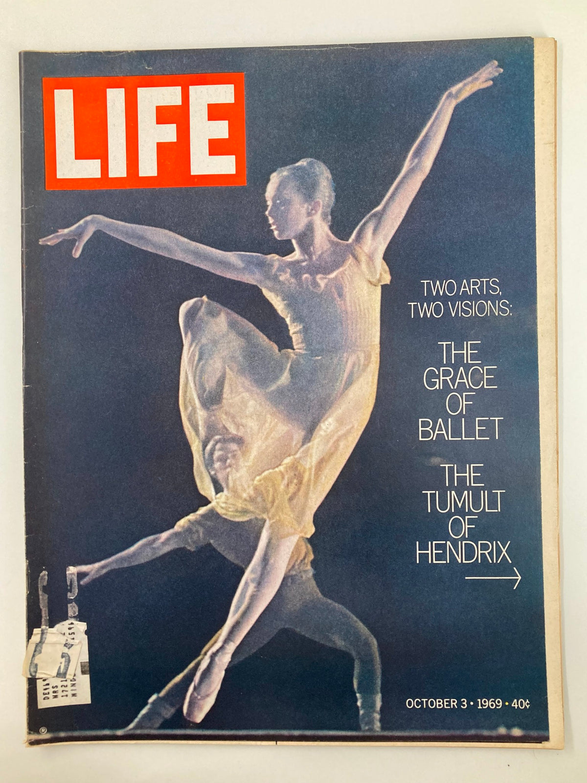 Cover of VTG Life Magazine from October 3, 1969, featuring the title 'The Grace of Ballet and The Tumult of Hendrix', showcasing a ballet dancer in a flowing yellow costume against a dark background, highlighting the artistic contrasts of dance and music.