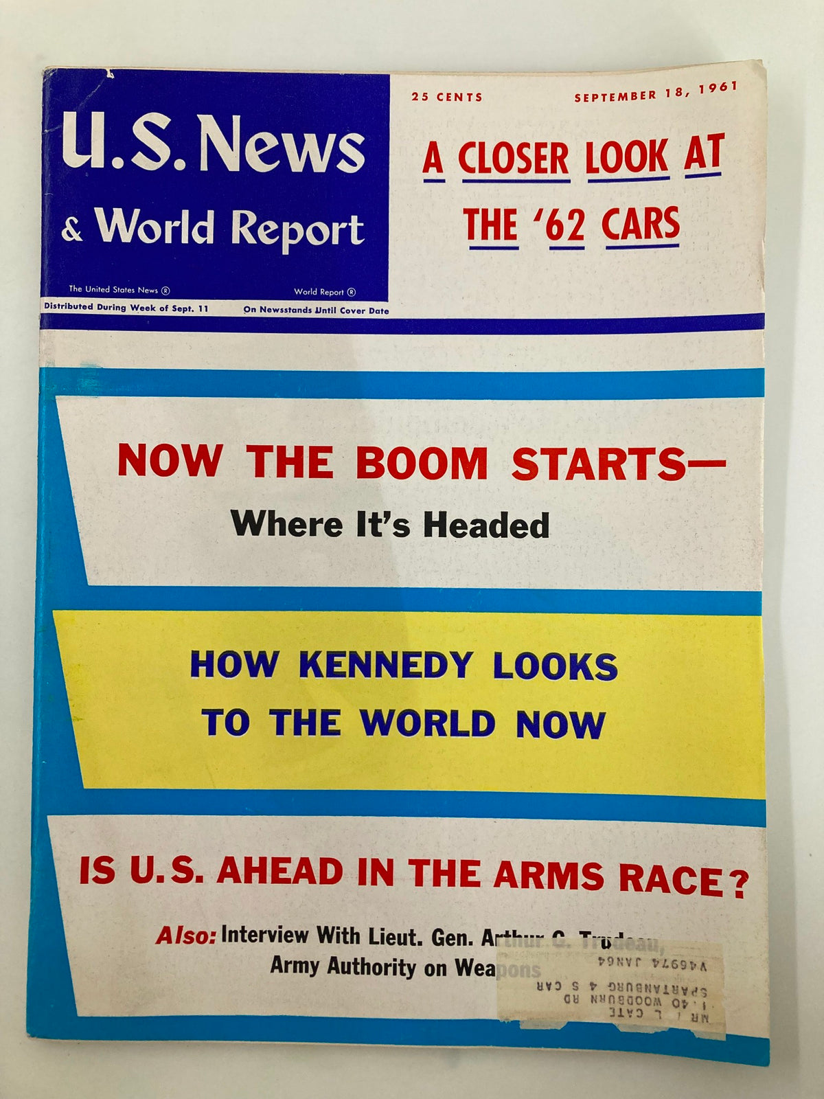 Cover of US News & World Report Magazine from September 18, 1961, featuring the title 'How Kennedy Looks To The World' with additional headlines about the 1962 cars and the U.S. arms race.