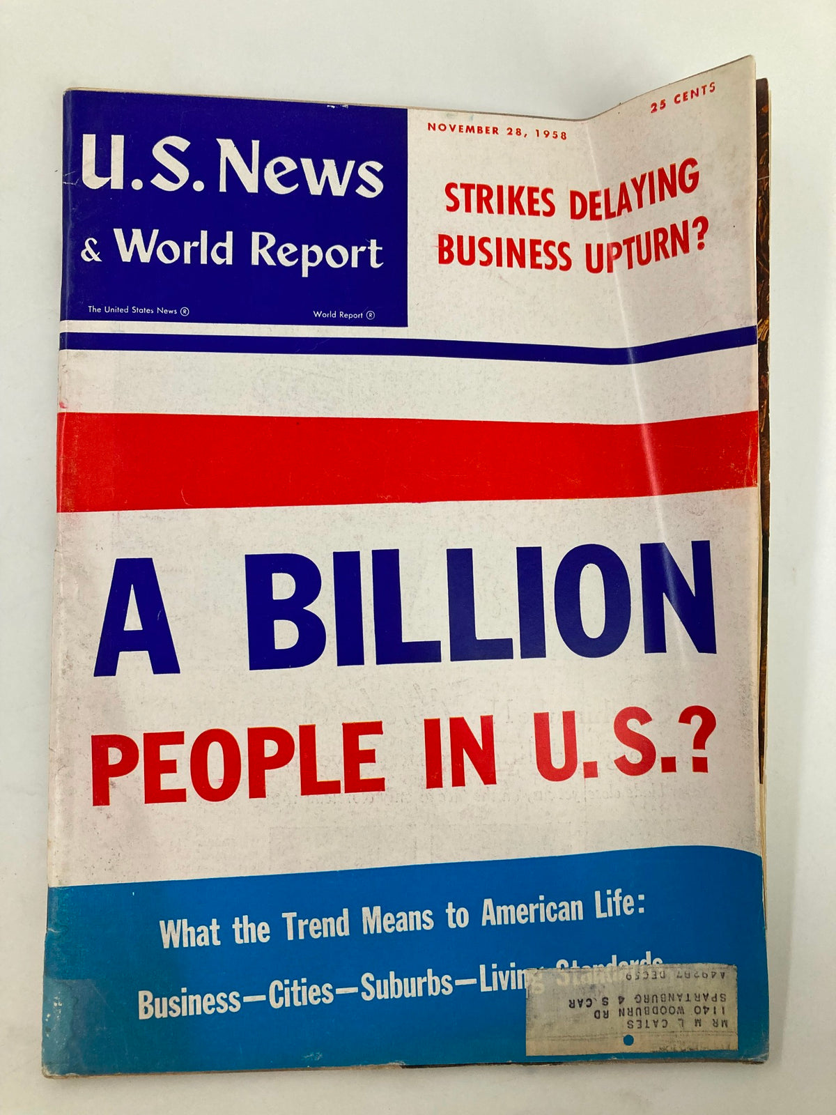 Cover of the US News & World Report Magazine from November 28, 1958, featuring the headline 'A Billion People In U.S.?' with a colorful design and additional text about business issues.