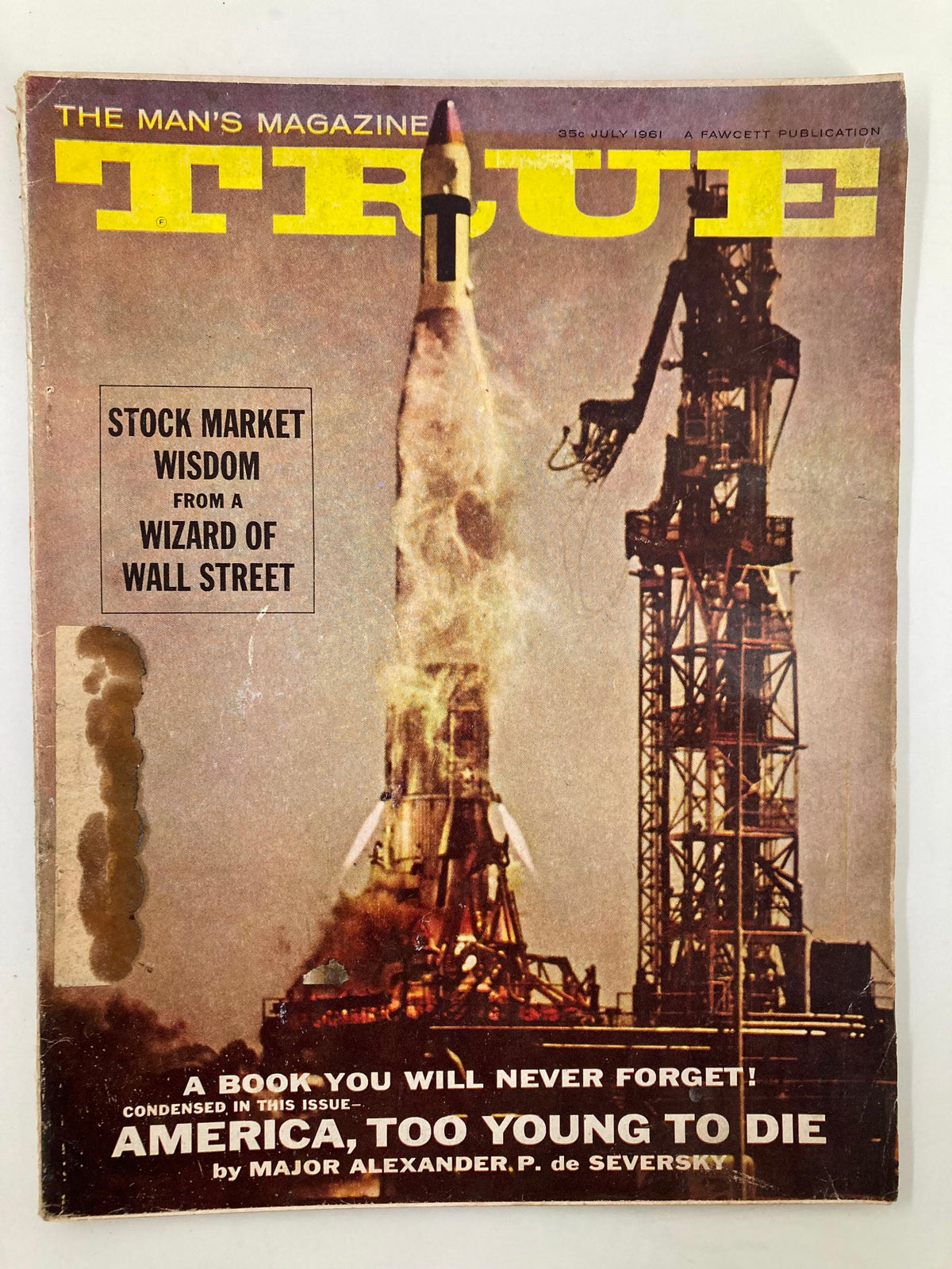 Cover of TRUE The Man's Magazine July 1961 showcasing a rocket launch with the headline 'Stock Market Wisdom from a Wizard of Wall Street'.