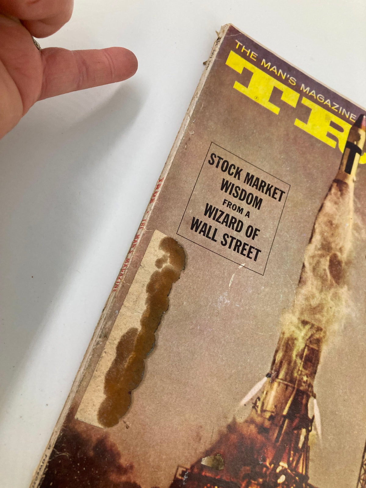 Close-up view of TRUE The Man's Magazine July 1961 cover, highlighting the text 'Stock Market Wisdom from a Wizard of Wall Street'.