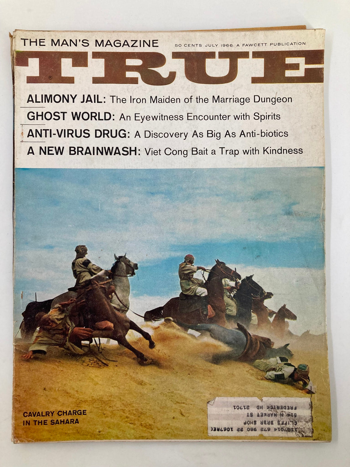 Cover of TRUE The Man's Magazine July 1966 featuring 'Cavalry Charge in The Sahara,' showcasing a military scene with riders on horseback in a desert landscape.