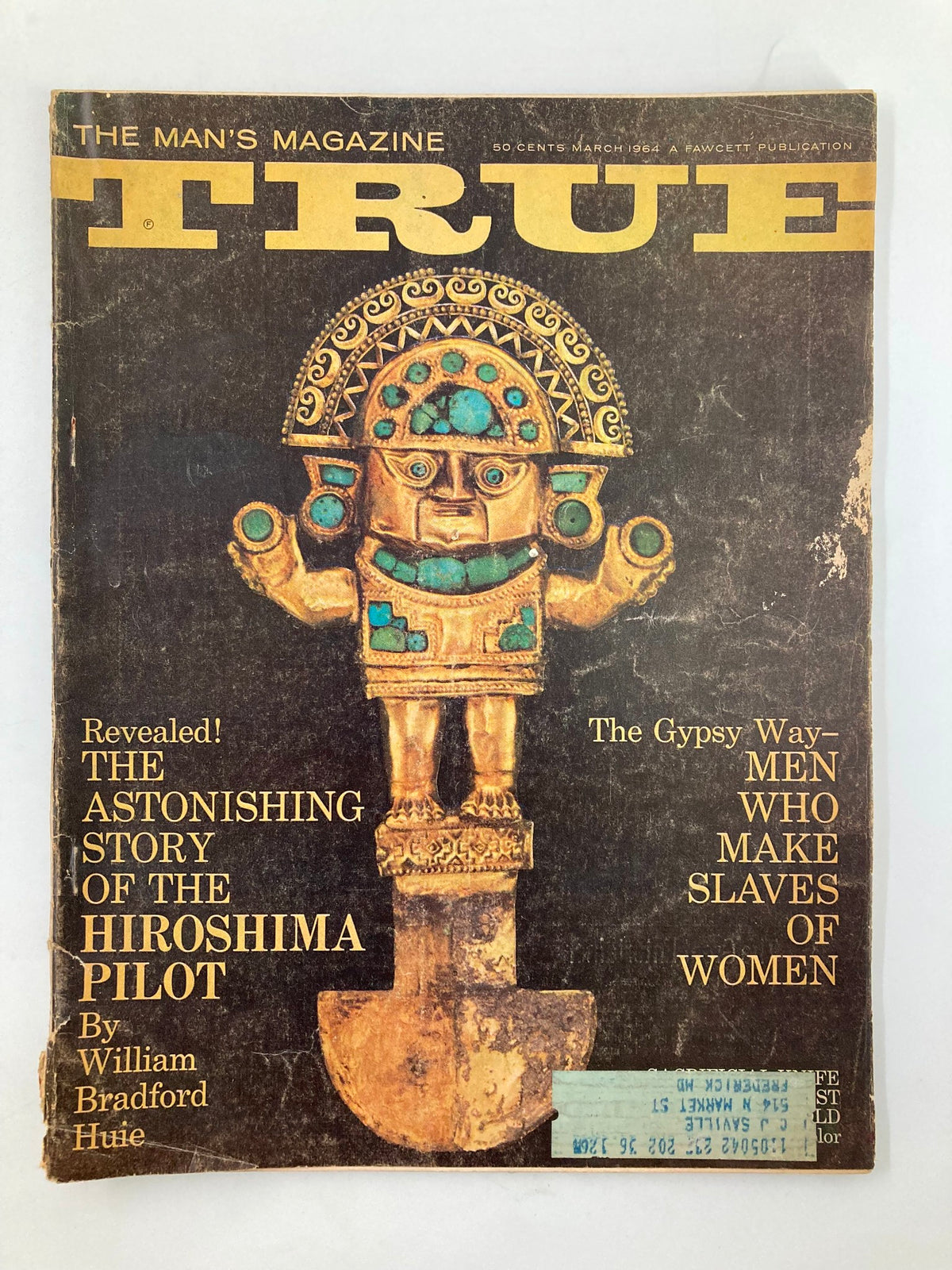 Cover of TRUE The Man's Magazine March 1964 featuring the headline 'The Astonishing Story of the Hiroshima Pilot' with an artistic depiction of a golden statue and vintage design elements.