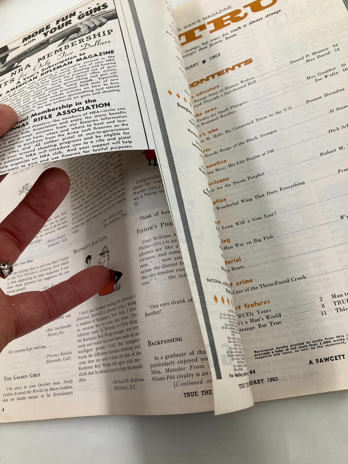 Inside view of TRUE The Man's Magazine January 1963, capturing a page that discusses articles including 'How Long Will a Gun Last?'