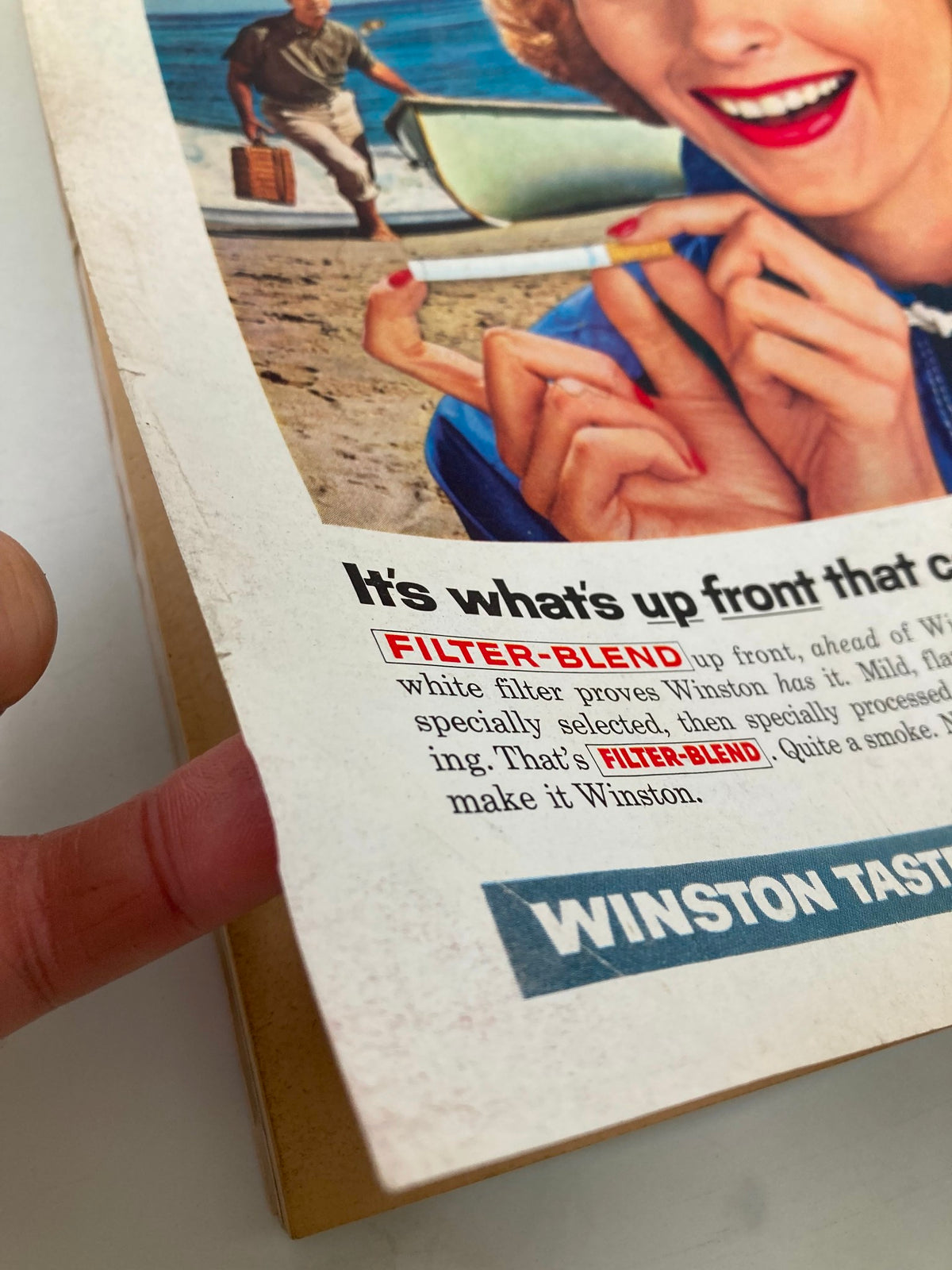 Close-up of an advertisement in TRUE The Man's Magazine June 1962 for Winston cigarettes, highlighting the 'FILTER-BLEND' feature.
