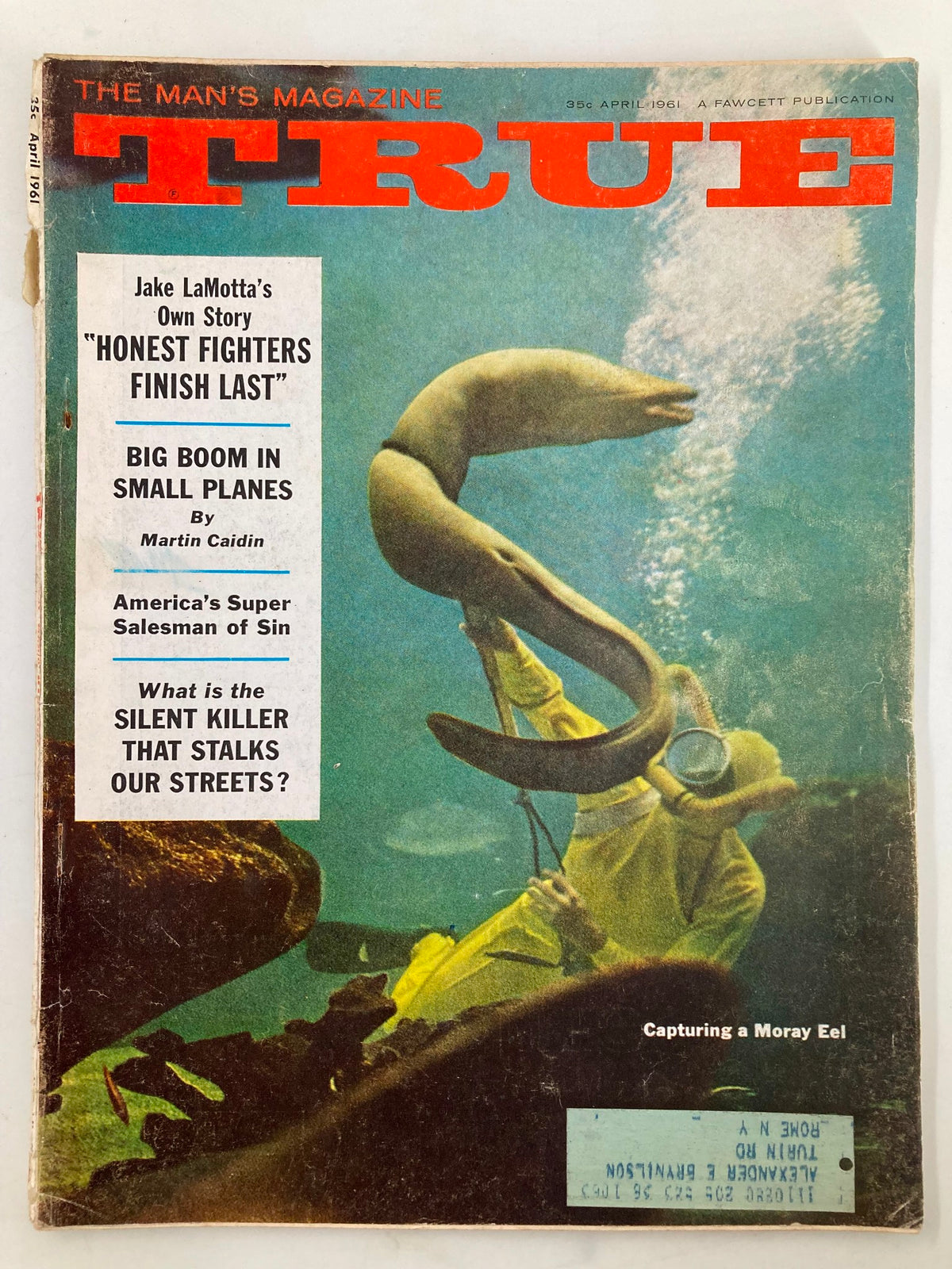 Cover of TRUE The Man's Magazine April 1961 featuring the headline 'Don't Let Them Take Your Guns Away' with underwater imagery and a diver capturing a Moray eel.