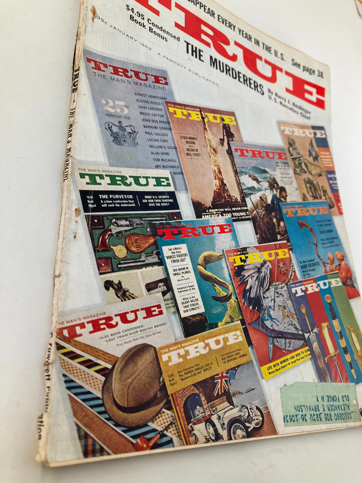 Side view of TRUE The Man's Magazine January 1962, featuring a colorful cover with multiple issue highlights including 'The Murderers'.