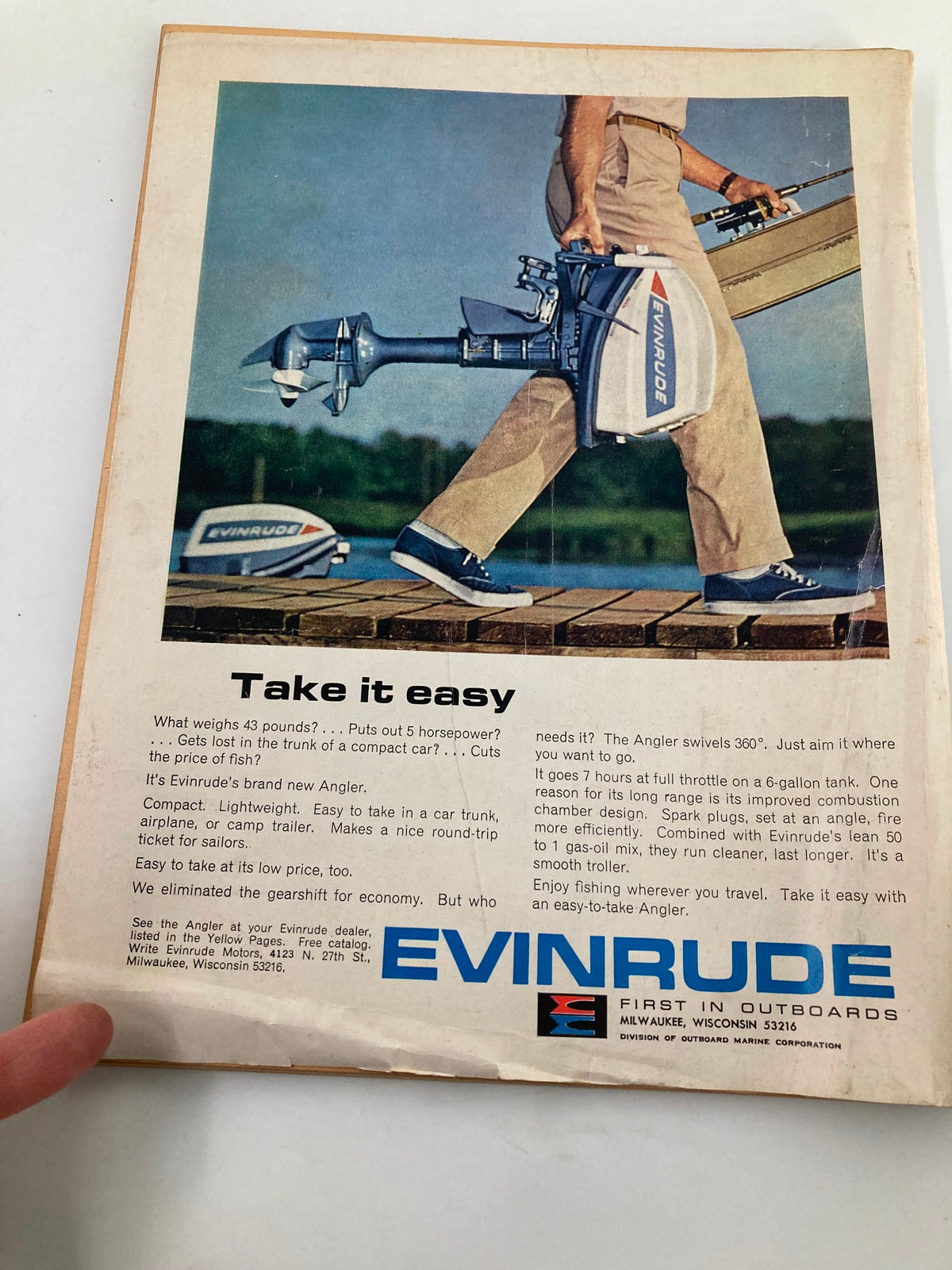 Back cover advertisement from TRUE The Man's Magazine March 1965 showcasing Evinrude outboard motors for fishing.