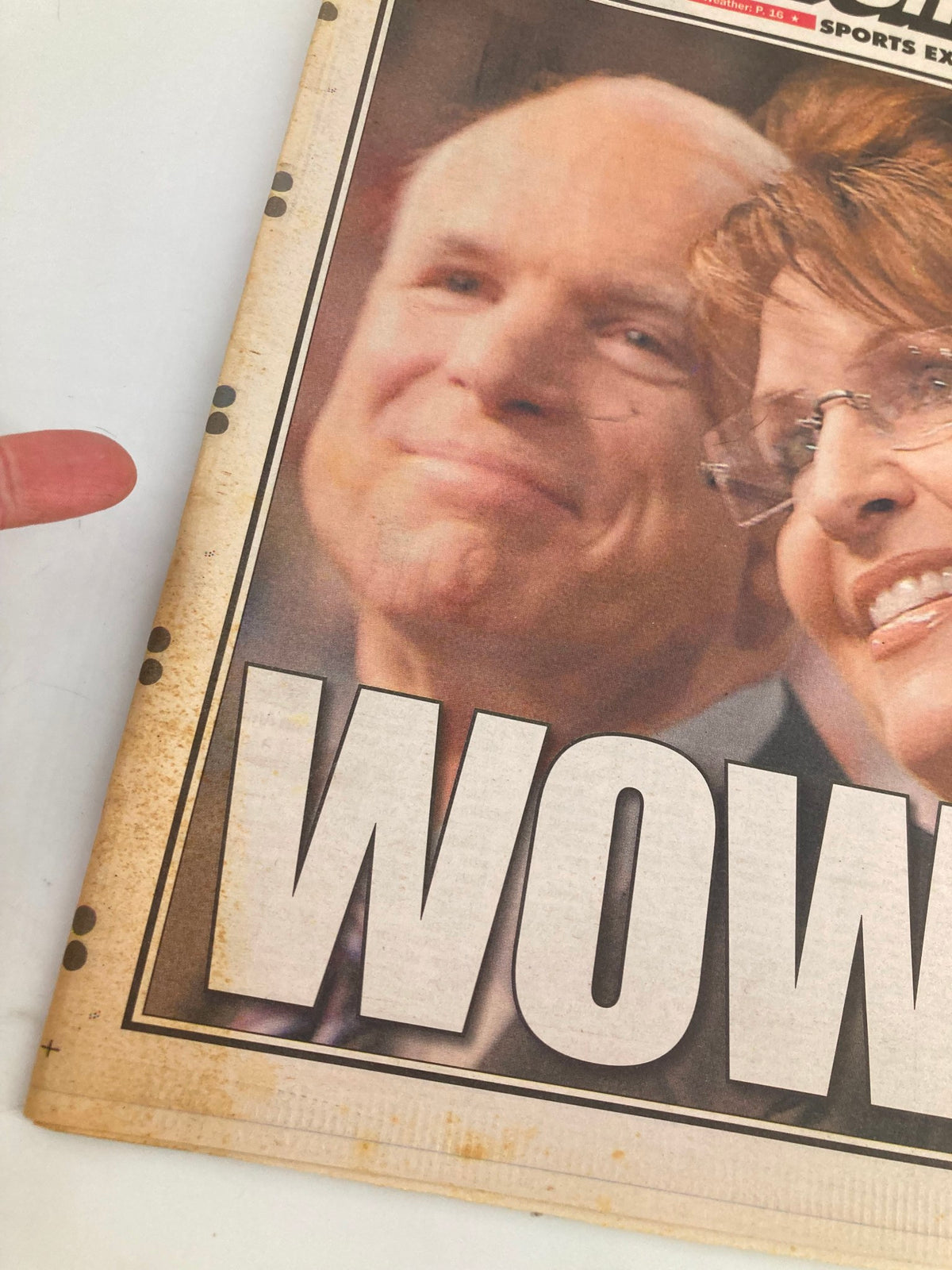 Close-up of New York Post Newspaper August 30 2008 cover showcasing Sarah Palin and John McCain's expressions with the prominent headline 'WOW! She hunts, she fishes, and she's Mac's veep!'