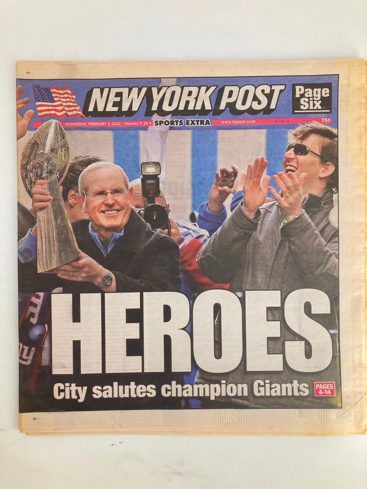 New York Post Newspaper February 8 2012 covering Heroes with a headline celebrating the City saluting the champion Giants, featuring an image of fans and team members with a trophy.