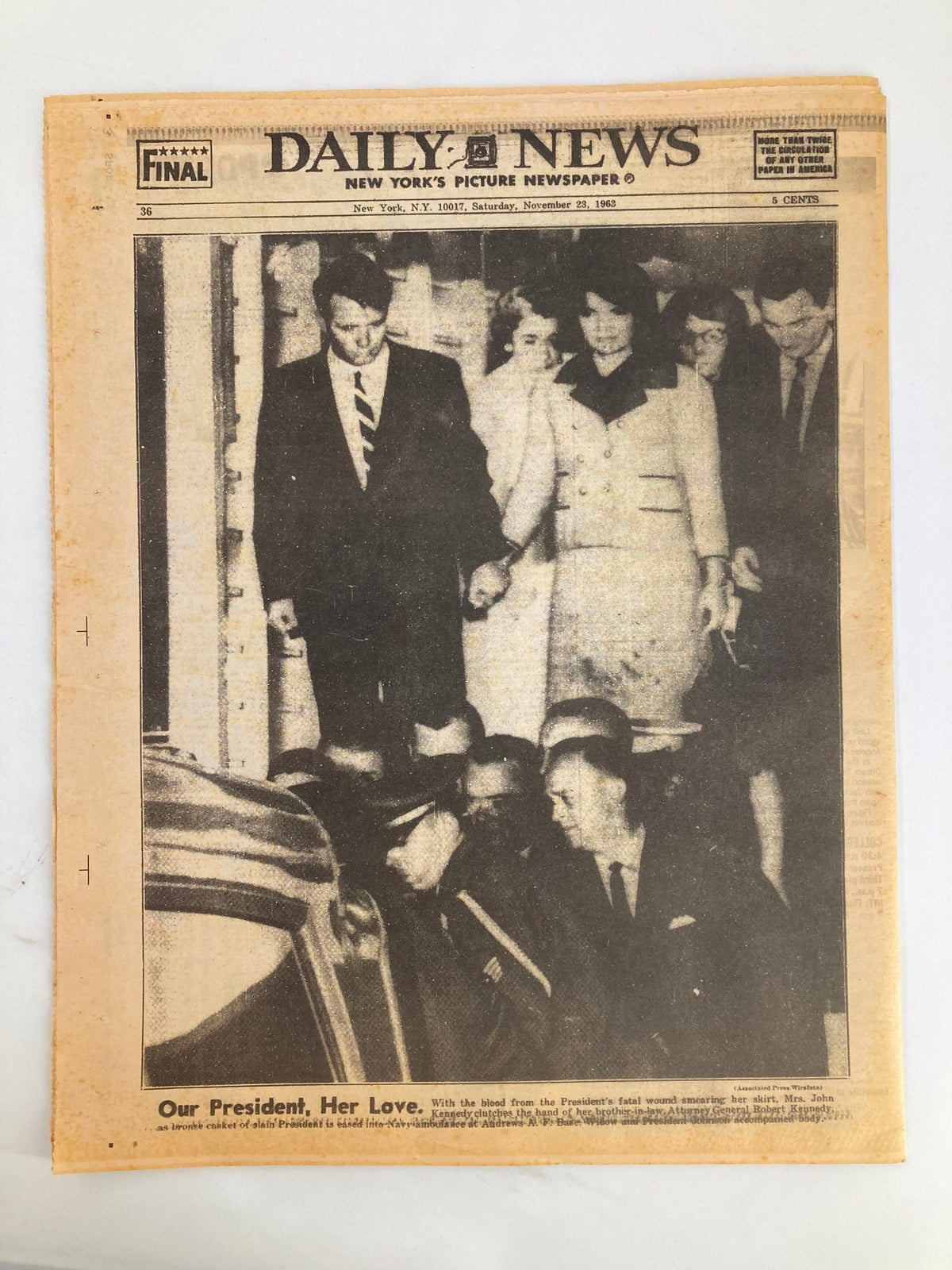 Historical photograph from the November 23, 1963 Daily News showing Lyndon Johnson during a moment following JFK's assassination.