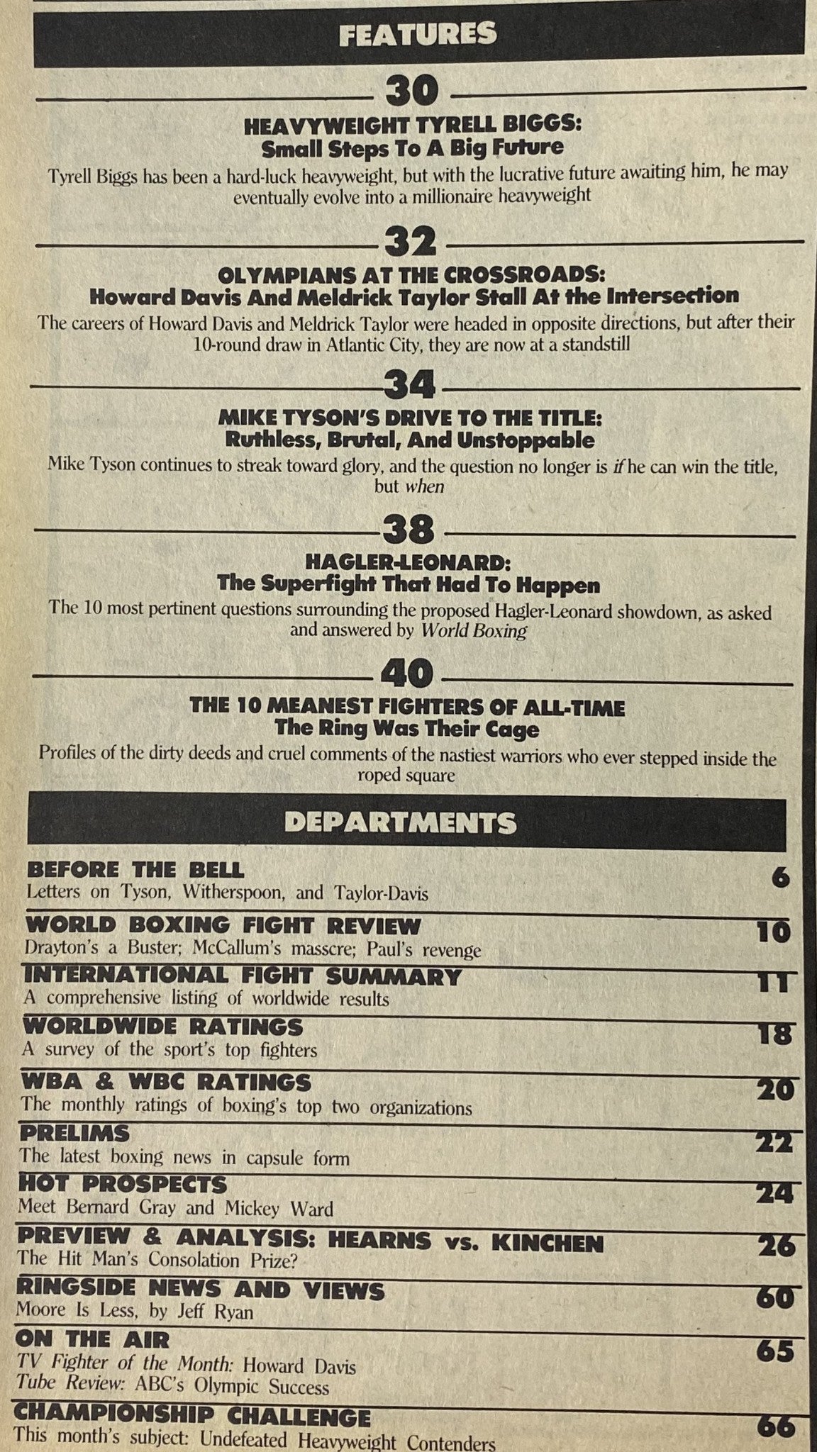 Interior page of World Boxing Magazine December 1986 displaying the features section, including articles on Tyrell Biggs and Mike Tyson's drive to the title, along with department listings.