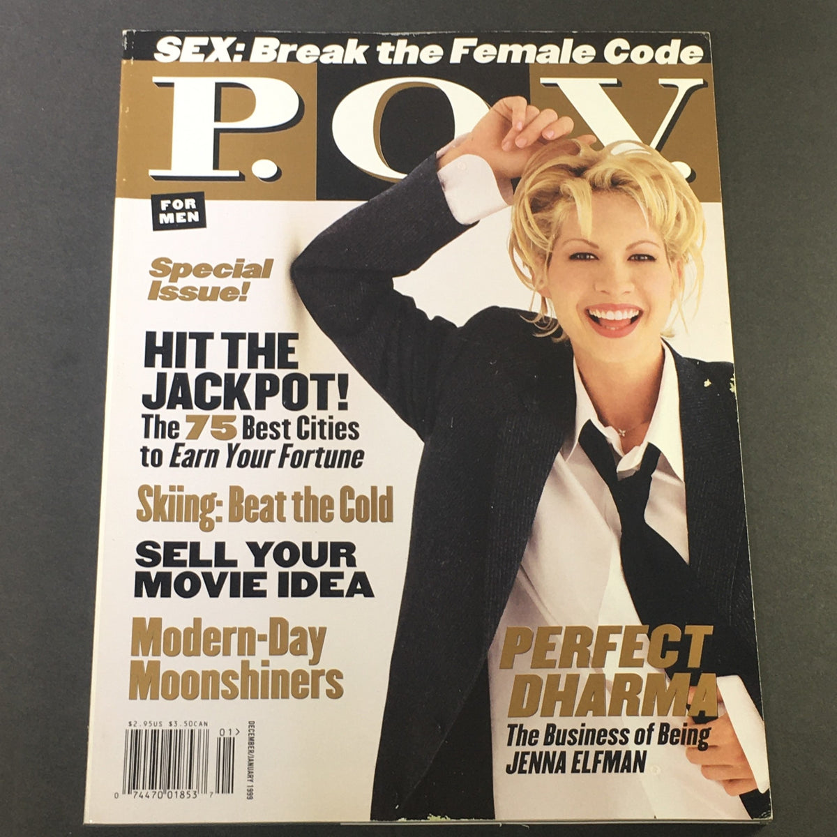 Cover of POV For Men Magazine December January 1999 featuring Jenna Elfman, with the headline 'SEX: Break the Female Code'. The issue includes articles on various men's topics and showcases 90s pop culture.