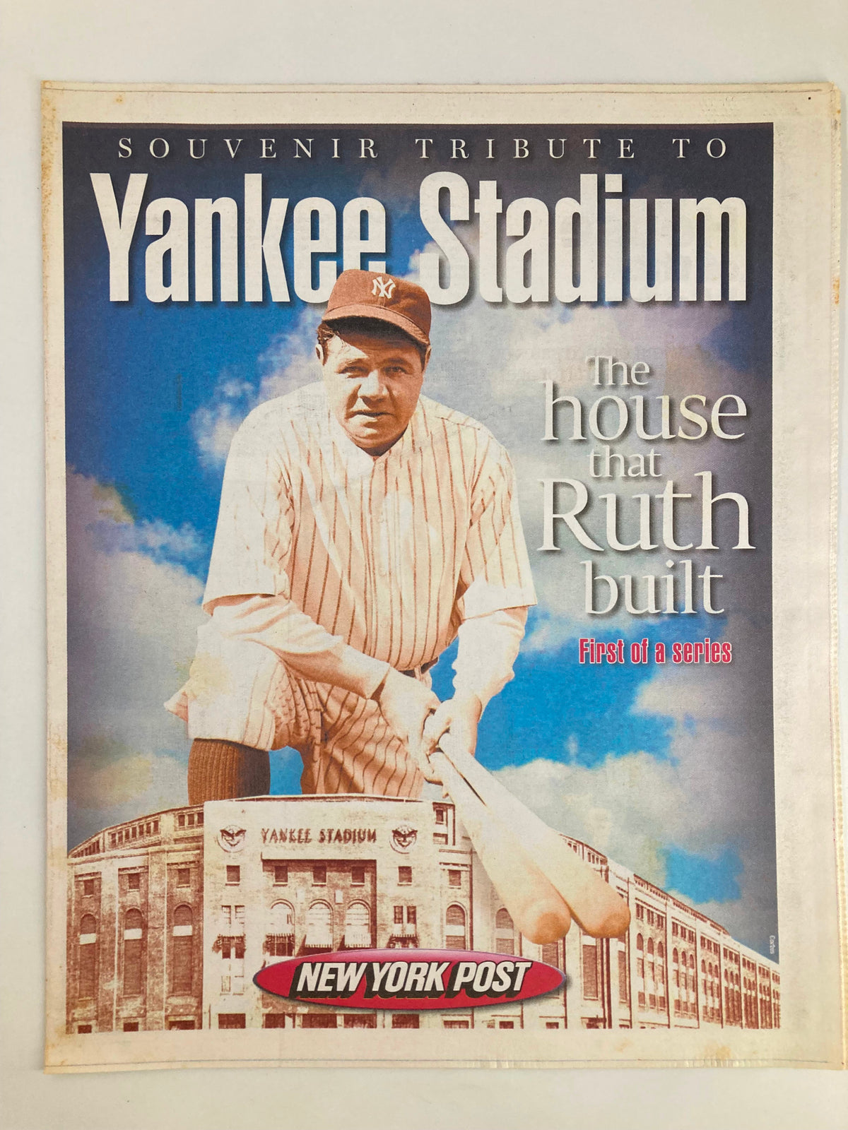 Cover of the New York Post newspaper titled 'The House That Babe Ruth Built' featuring Babe Ruth in baseball attire and Yankee Stadium in the background.